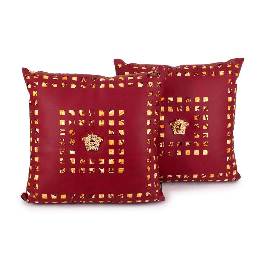 Versace Home Burgundy Baroque Silk Twill Faux Leather Pair of Cushions

- Double-sided cushion featuring one side in all-over gold and burgundy Baroque print, the other topped geometric laser-cut faux-leather and a decorative 3D gold-tone Medusa
