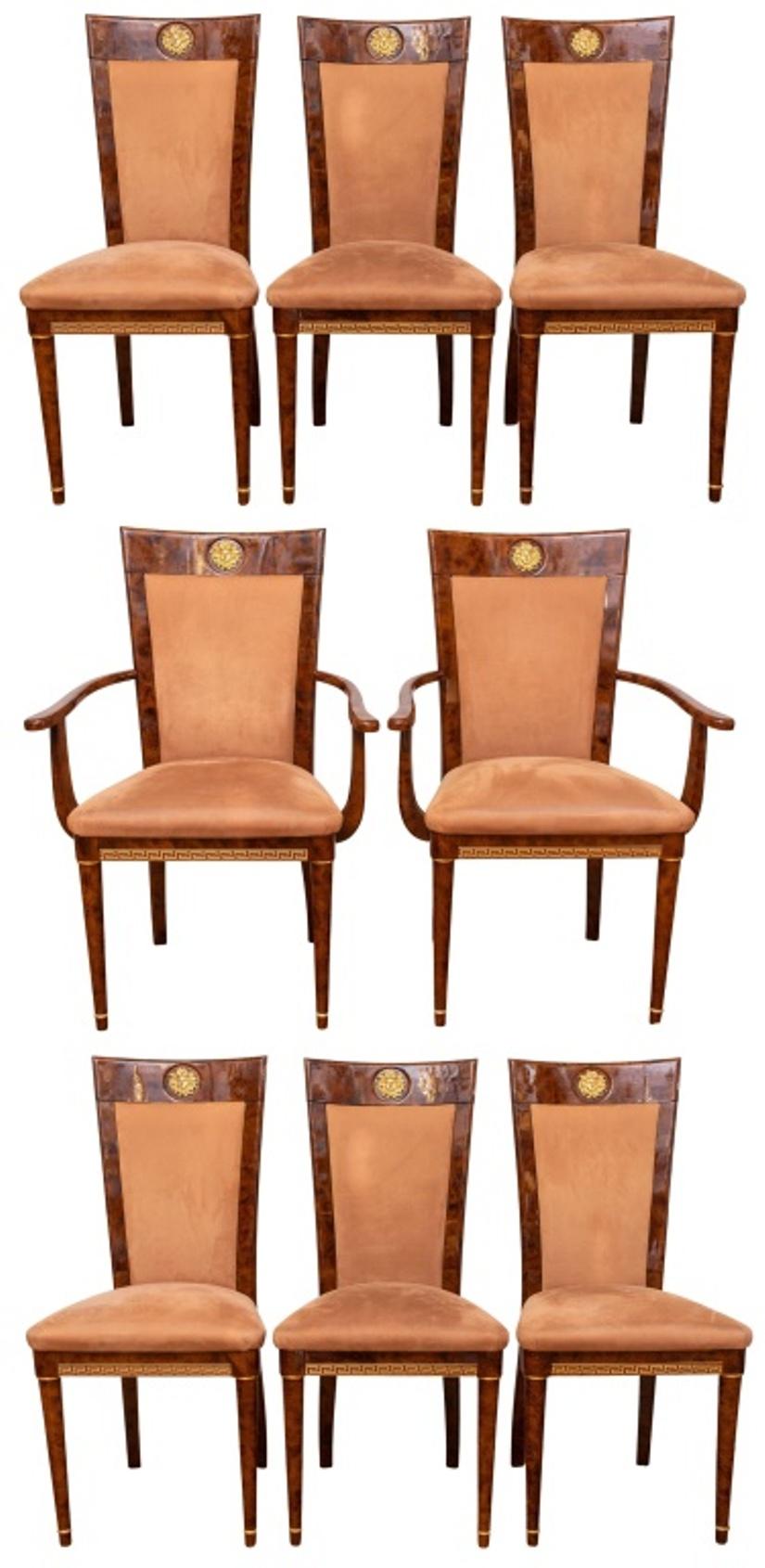 Versace home dining chairs in the neoclassical taste, 8, comprising two (2) arm chairs and six (6) side chairs in a fantasy burlwood lacquer finish, each with curved crest rail centering a gilded bronze Versace Medusa head above tapering rectangular