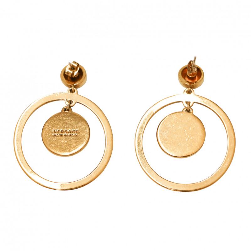 Condition: very good
Made in Italy
Material: metal
Color: gold, black
Dimensions: diameter 4 cm x height 5 cm
Jewelry: aged gold
Stamp: yes
Details : ICONIC stud earrings surmounted by the famous Medusa, the Versace emblem.