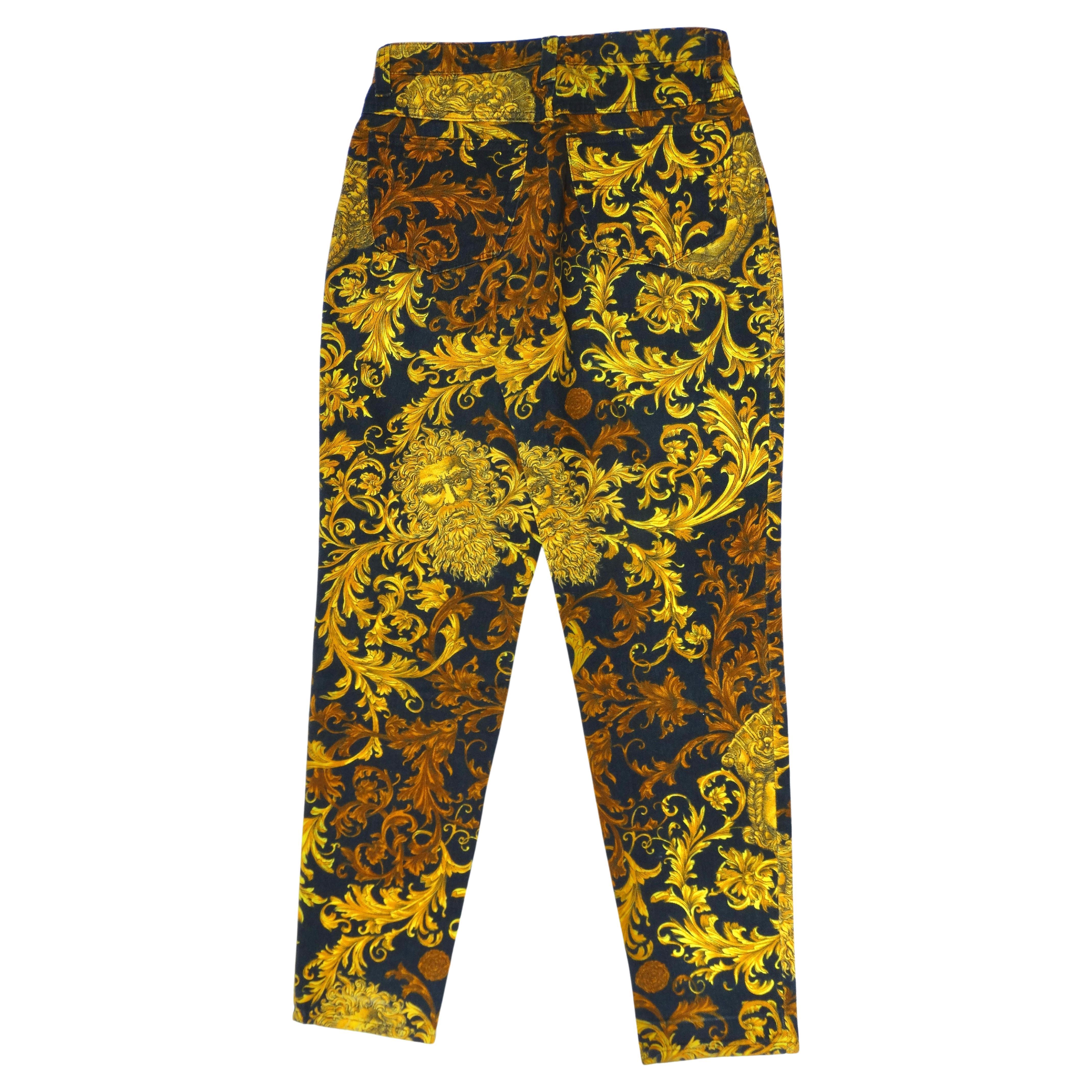 A classic Versace gem! Sometimes more is more. These jeans feature a slim cut silhouette, high-waist, and a cropped leg. They are decorated with a baroque print all over and finished with the brand's signature Zeus's Head plaque to the rear. Pair