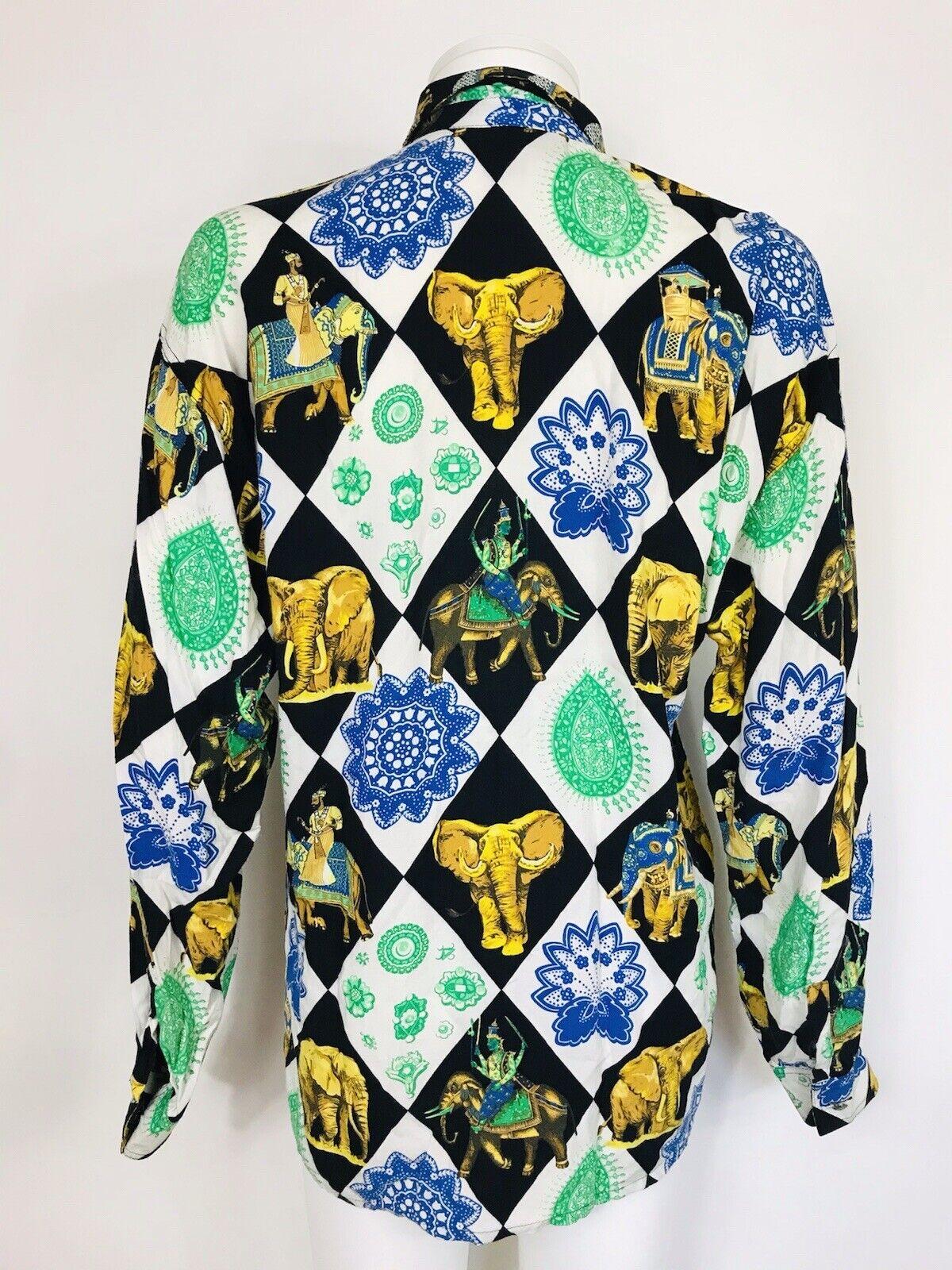 Versace Jeans Couture Gianni Black & White Checkered Vintage 90's Bright Elephant India Print Pattern Corduroy Button Up Shirt Jacket


Vintage and rare Versace Jeans Couture corduroy black and white checker background with a bright colorful India