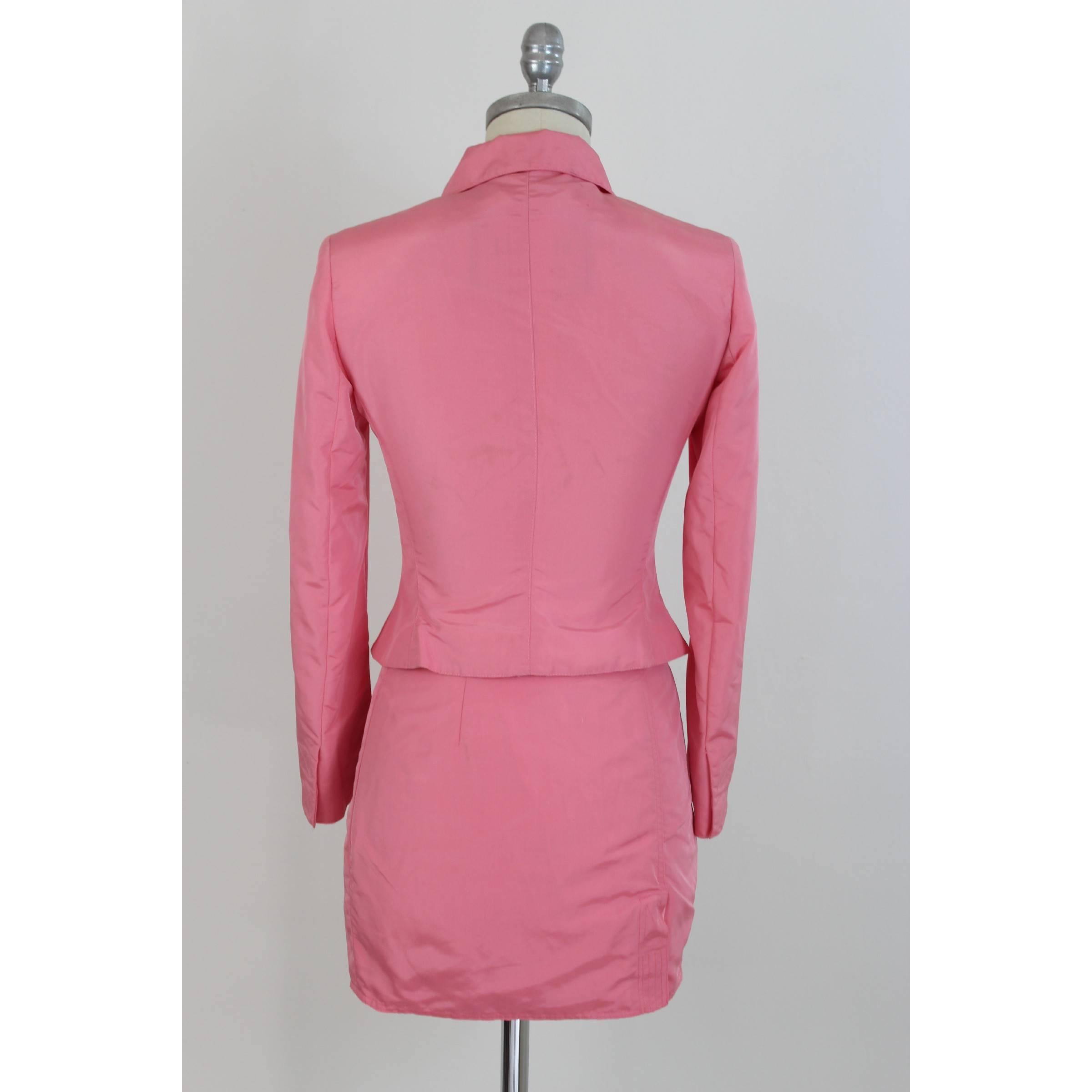 Versace Jeans Couture set, pink, 99% polyamide 1% polyurethane. The outfit consists of a jacket and a skirt, a short jacket with a slim fit waistband, internal buttons closure and velcro straps, the mini model skirt has a velcro closure along the
