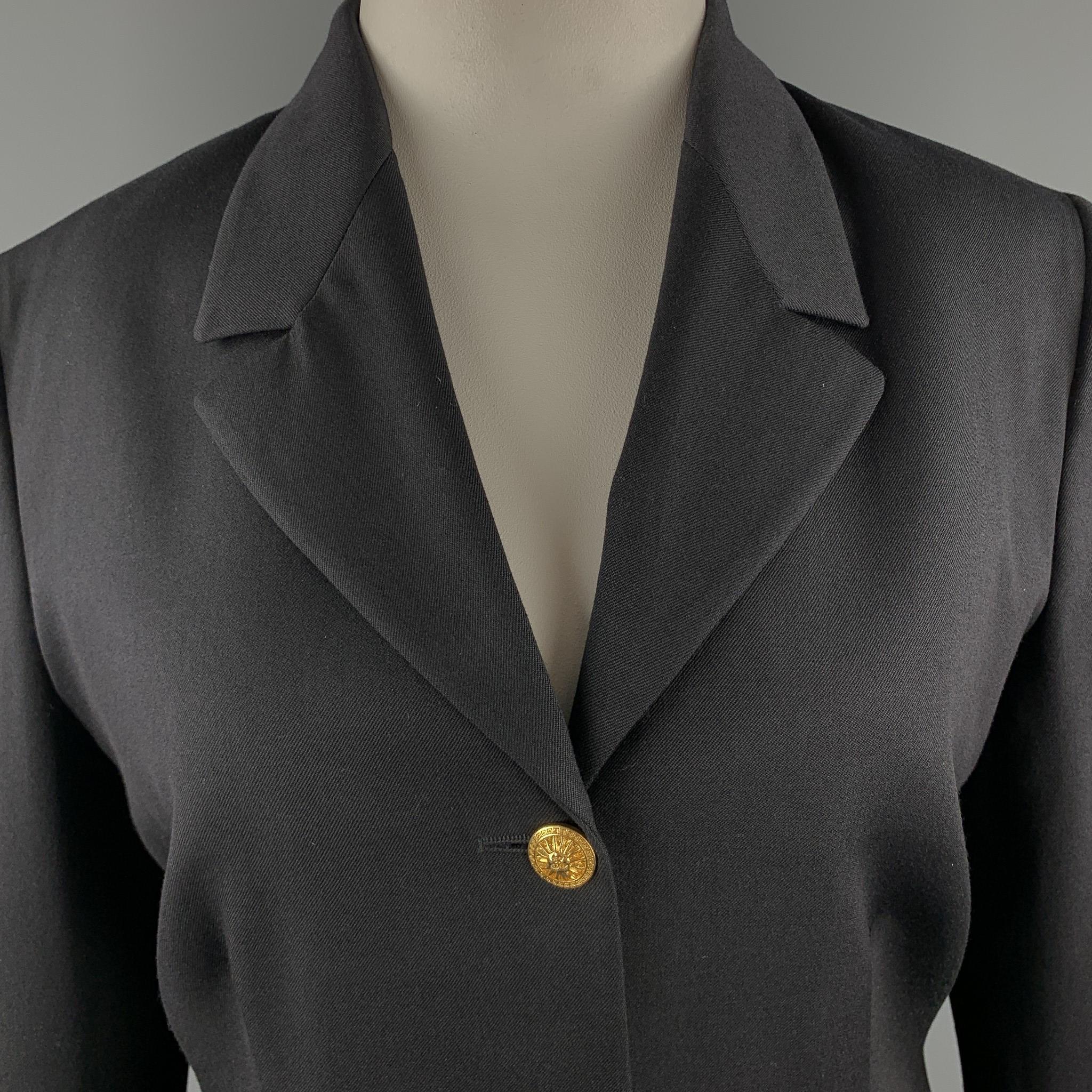 Vintage 1990's VERSACE JEANS COUTURE by GIANNI VERSACE skirt suit comes in black wool twill and includes a single breasted three button blazer with yellow gold tone sun buttons and studded trim with a matching pencil mini skirt. Made in