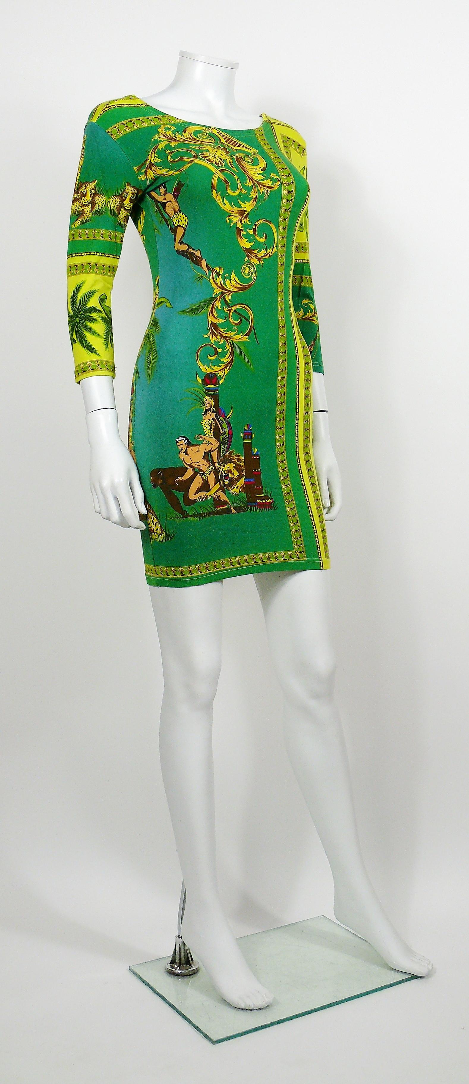 VERSACE JEANS COUTURE vintage 1990s rare bodycon dress featuring a TARZAN and JANE, jungle and tropical vibrant print.

Slips on.
Stretchy fabric.

Label reads VERSACE JEANS COUTURE.
Made in Italy.

Size tag reads : 30/44.
Please refer to