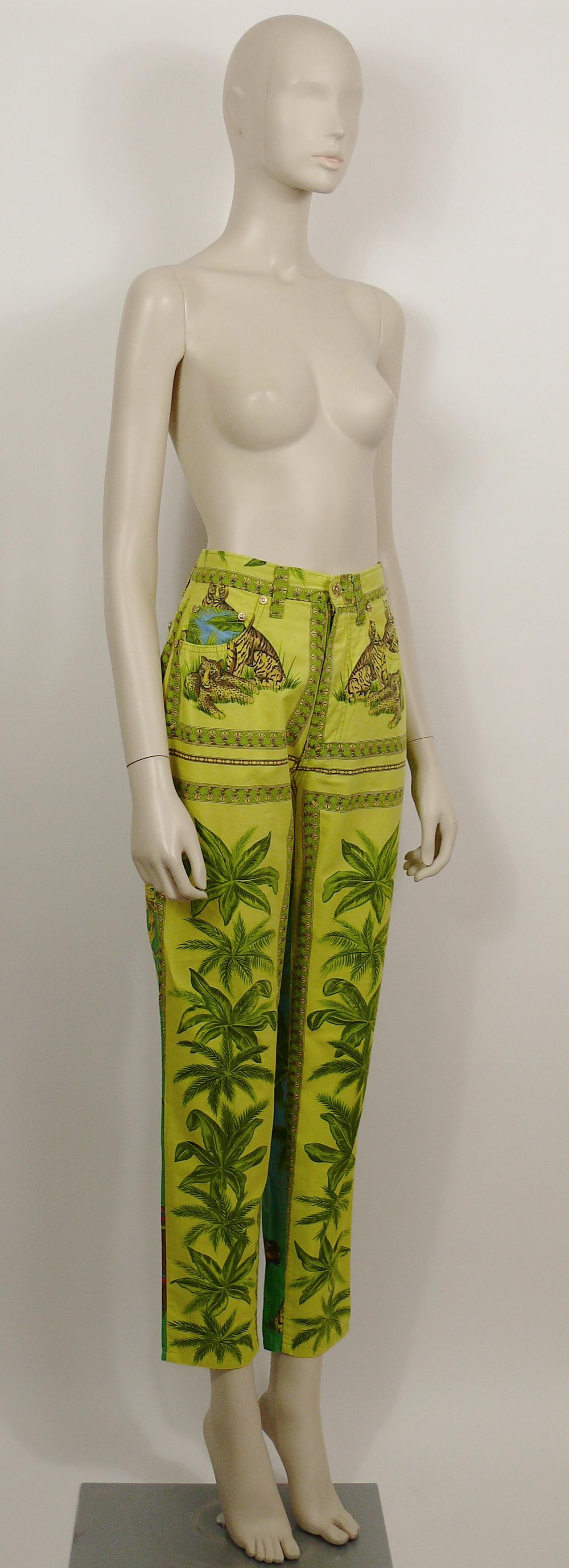 VERSACE JEANS COUTURE vintage 1990s TARZAN and JANE, jungle, tropical and wild animals print pants.

Pockets are studded with Versace gold toned sun buttons.
Button and zipper closure at the front.
2 front pockets and 2 back pockets.
Belt