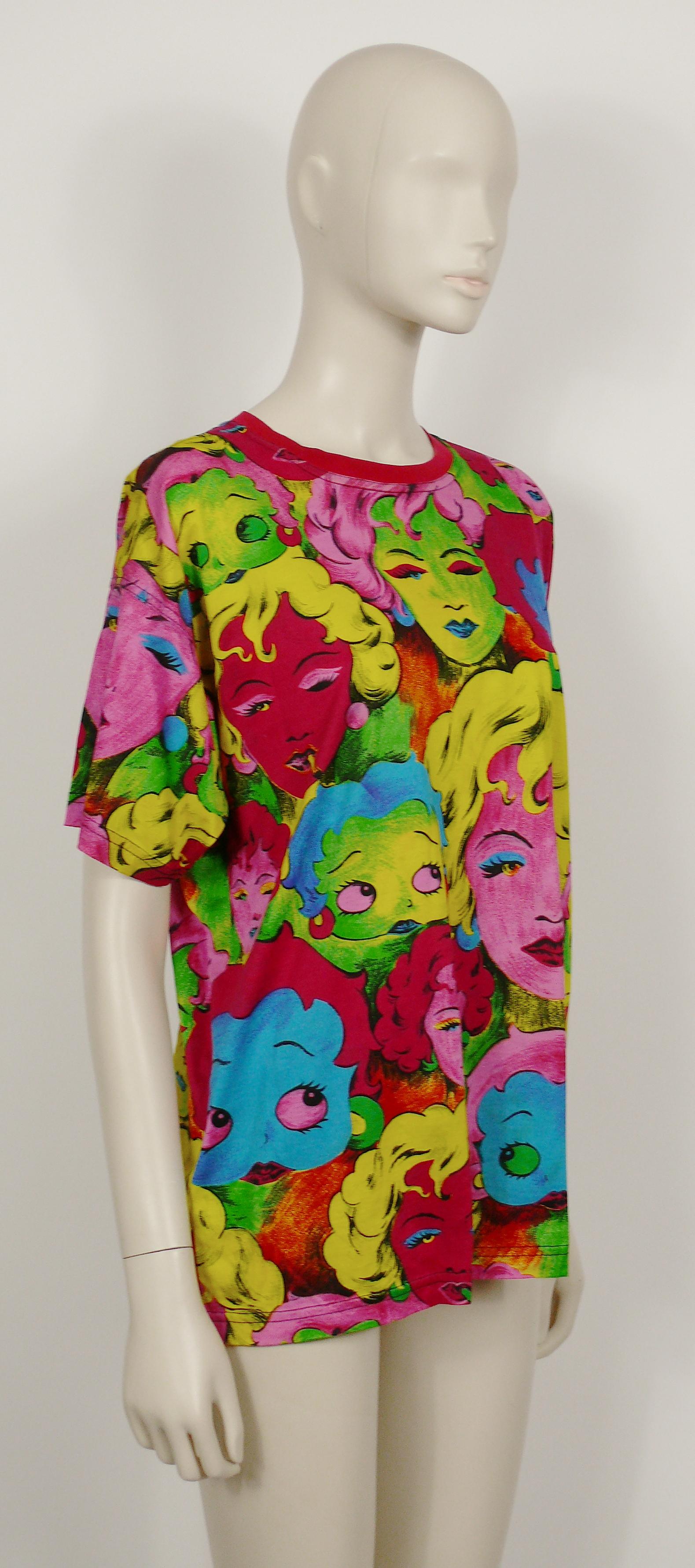 VERSACE JEANS COUTURE vintage rare t-shirt featuring ANDY WARHOL's style portrait prints in vibrant colors of MARYILYN MONROE and BETTY BOOP all over.

Spring/Summer 1991 Collection.

Label reads VERSACE JEANS COUTURE.
Made in Italy

Composition