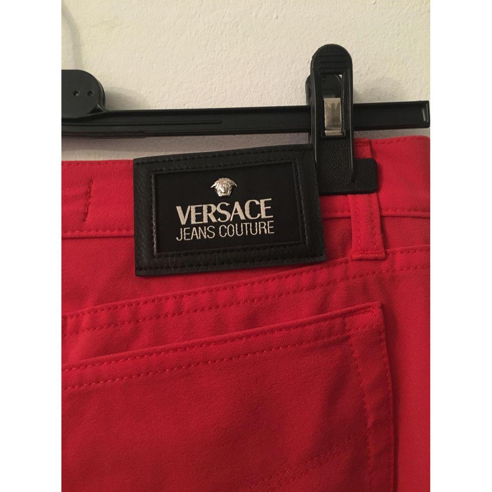Pantalon rouge en jean et spandex Versace Bon état - En vente à Carnate, IT