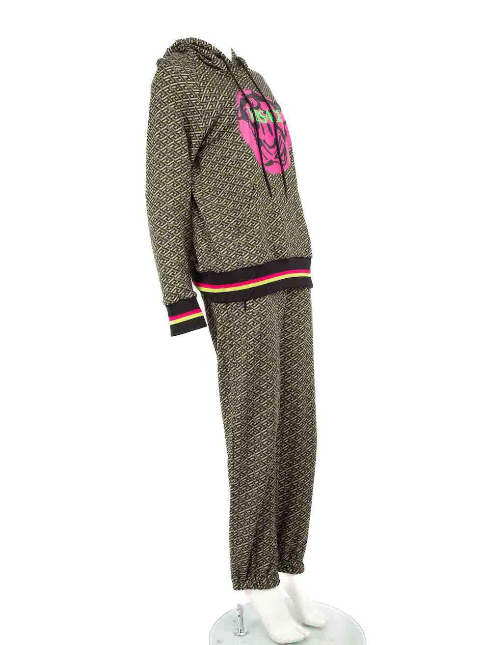 CONDITION is Very good. Hardly any visible wear to the tracksuit is evident on this used Versace designer resale item.
 
 
 
 Details
 
 
 Khaki
 
 Cotton
 
 Matching hoodie and tracksuit set
 
 Logo pattern
 
 Long sleeves hoodie
 
 Front graffiti