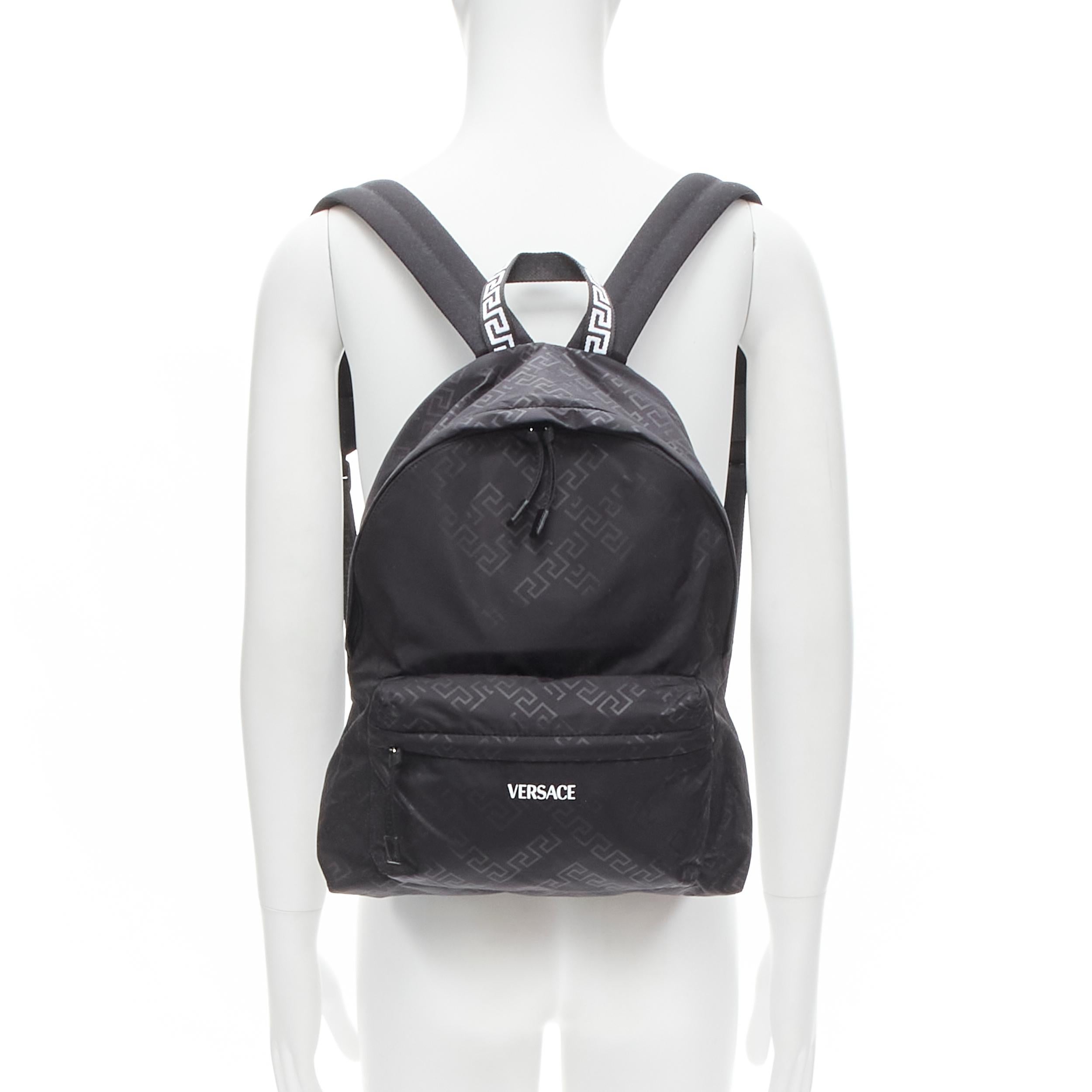 VERSACE La Greca Greek Key black 90's logo backpack bag
Reference: TGAS/C00865
Brand: Versace
Designer: Donatella Versace
Model: DFZ8582S DNYJS D41P
Material: Nylon
Color: Black
Pattern: Abstract
Closure: Zip
Lining:  Nylon
Extra Details: Black