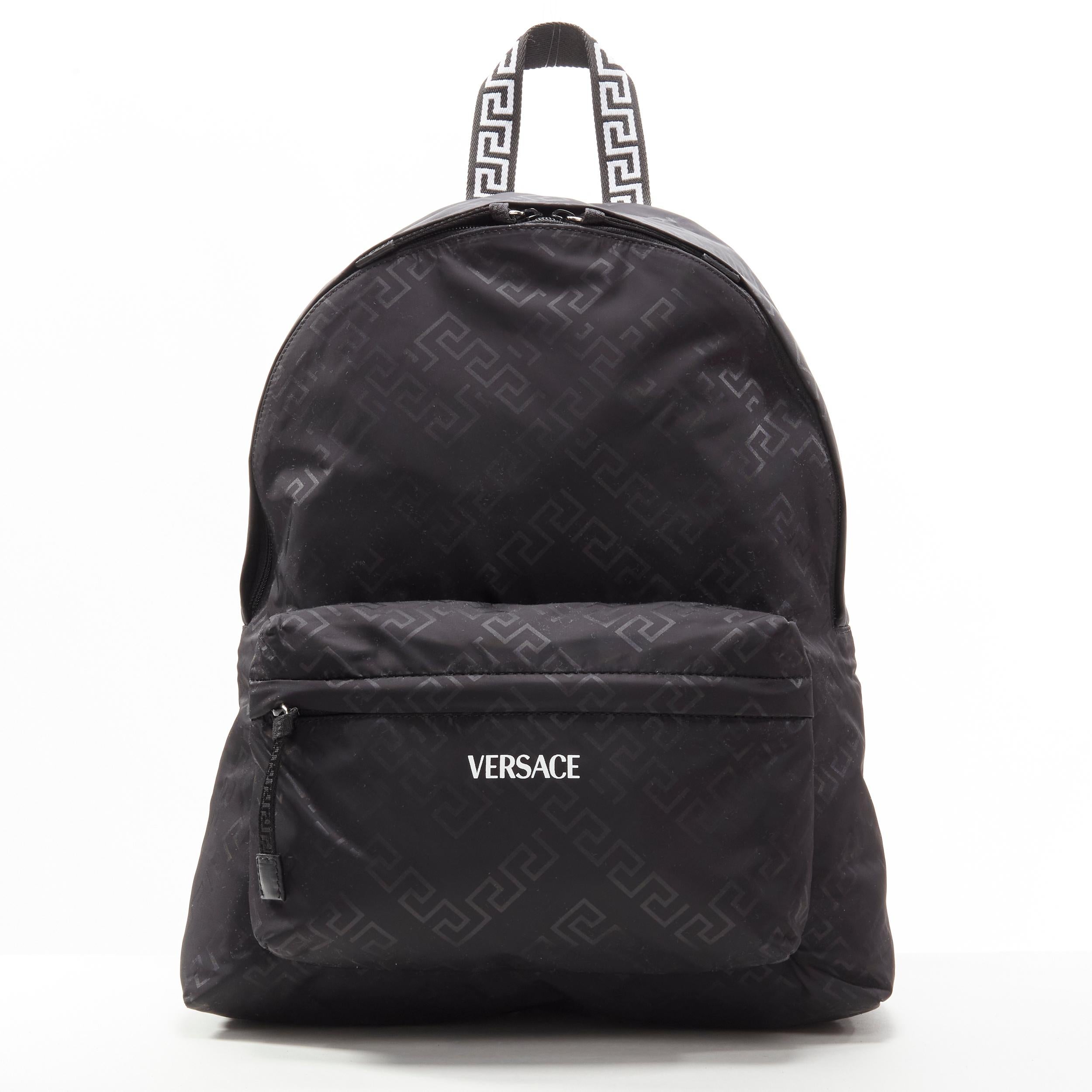VERSACE La Greca Greek Key black 90's logo backpack bag
Reference: TGAS/C00867
Brand: Versace
Designer: Donatella Versace
Model: DFZ8582S DNYJS D41P
Material: Nylon
Color: Black
Pattern: Abstract
Closure: Zip
Lining: Nylon
Extra Details: Black