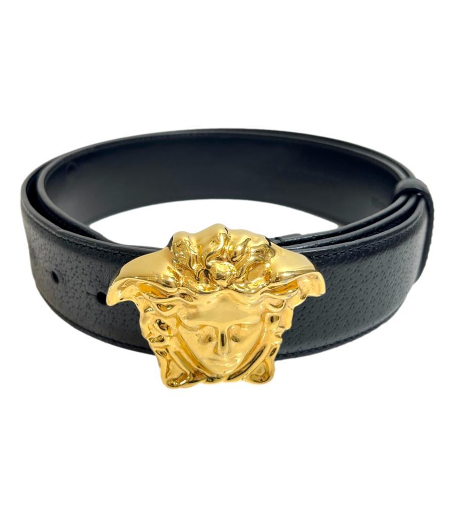 Versace La Medusa Greco Leather Belt

Black leather with gold oversized 3D medusa head buckle.

Rrp £410

Size - 95cm (Large Buckle Model)

Condition - Good/(Light signs of wear)

Composition - Leather, Metal

Comes With - Belt Only