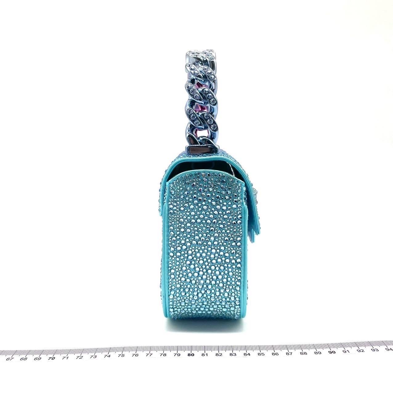 Versace La Medusa Mini Crystal Embellished Top Handle Bag in Purple
 These are professional photos of the actual bag offered by Luxbags.
 CONDITION: NEVER WORN
 DETAILS
 
 Versace
 Size: Mini
 
 Bottom Width: 16cm  6.25 in
 
 Height: 13.5cm  5.25