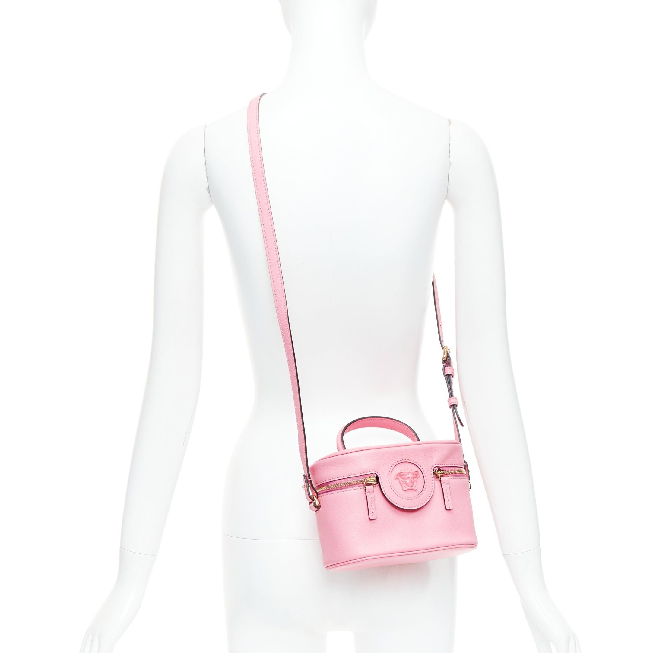VERSACE La Medusa Vanity pink gold hardware mini crossbody bag
Reference: BNAY/A00006
Brand: Versace
Designer: Donatella Versace
Model: La Medusa
Material: Leather
Color: Pink
Pattern: Solid
Closure: Snap Buttons
Lining: Pink Fabric
Extra Details: