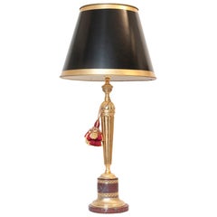 Lampe Versace:: socle néoclassique en bronze et marbre rouge