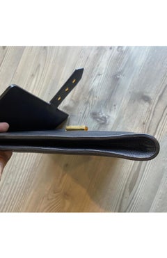 Versace leather clutch.