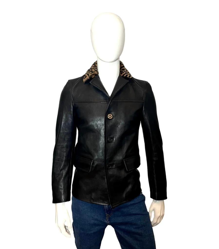 Versace Leather Jacket With Greca Fur Collar

Black nappa leather jacket, single breasted with a top button with Medusa detailing, other button in black with logo. Flap pocket and button to the cuffs. Fully lined.

Additional information:
Size –