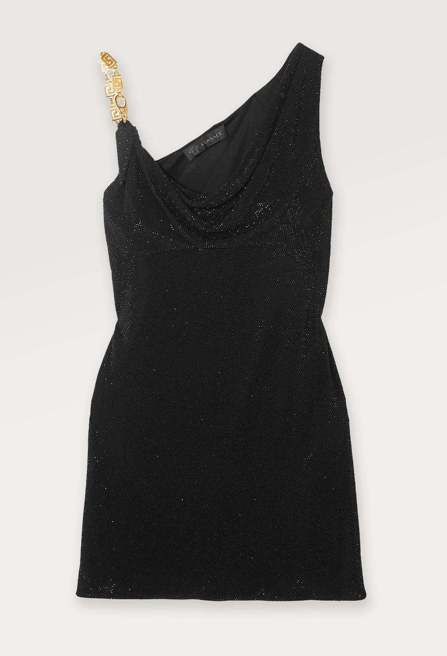 Be the star of any party in Versace's Embellished Crystal Dress. Covered in black crystals, this mini dress shimmers like a disco ball. This piece features '90s-inspired cowl neckline and iconic greca hardware. 

RRP $5000 USD 
Limited edition 
Made