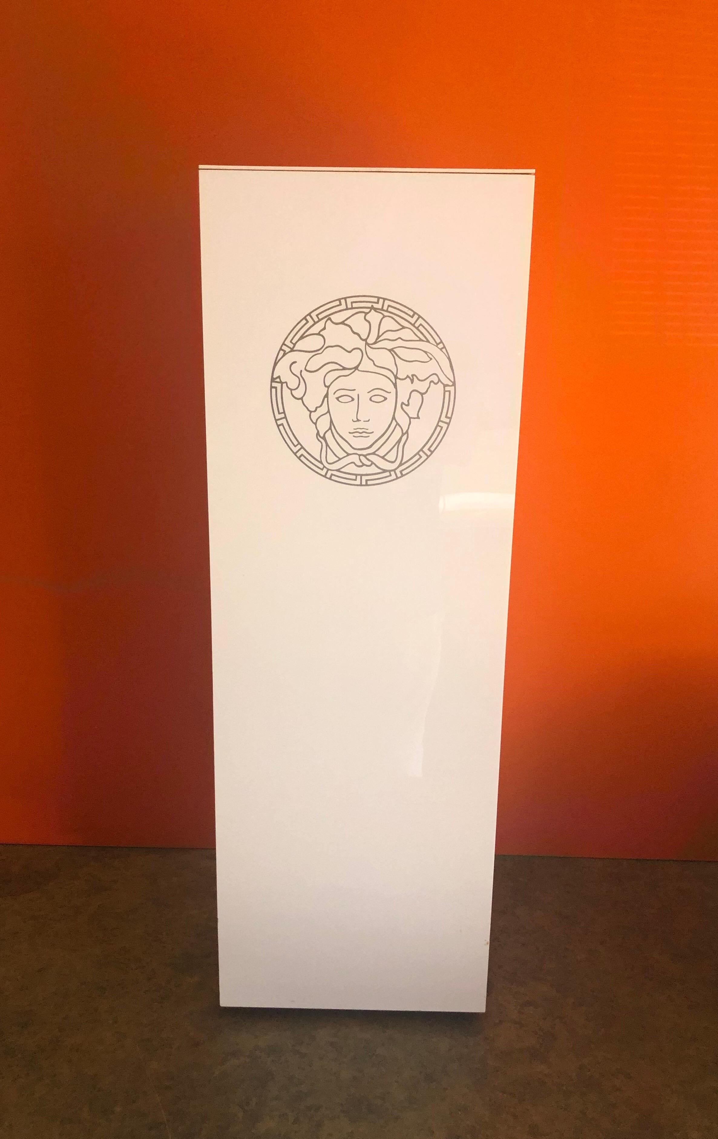 Laminated Versace Logo Pedestal in White Plastic Laminate