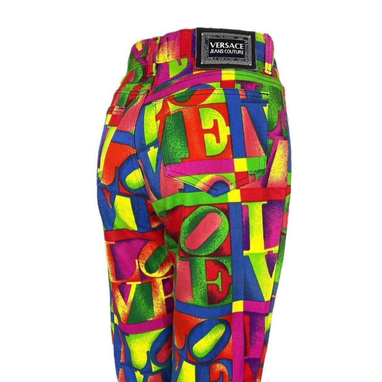 Versace Love Printed Jeans Couture Spring  / Summer 1995 Vintage Print 

Rare iconic Design and print by artist,  Robert Indiana

Iconic and sought-after Pop Art Love Printed Jeans

High-Waisted Trousers  / Pants

CONDITION: This item is a