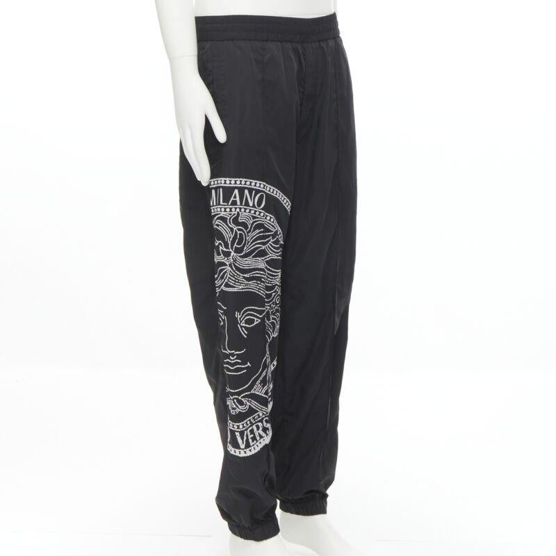 Black VERSACE Medusa Big Logo print black nylon Y2K track pants IT54 XXL