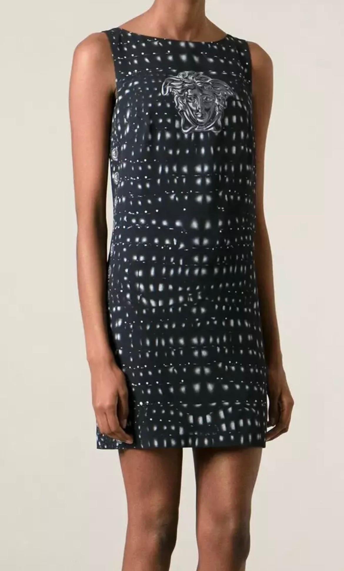 VERSACE DRESS
This Cocktail dress features Medusa print and short, straight cut.
Content: 100% Viscose, 
trim 100% silk
Fully lined
IT Size 46 - US 10
armpit to armpit 19
