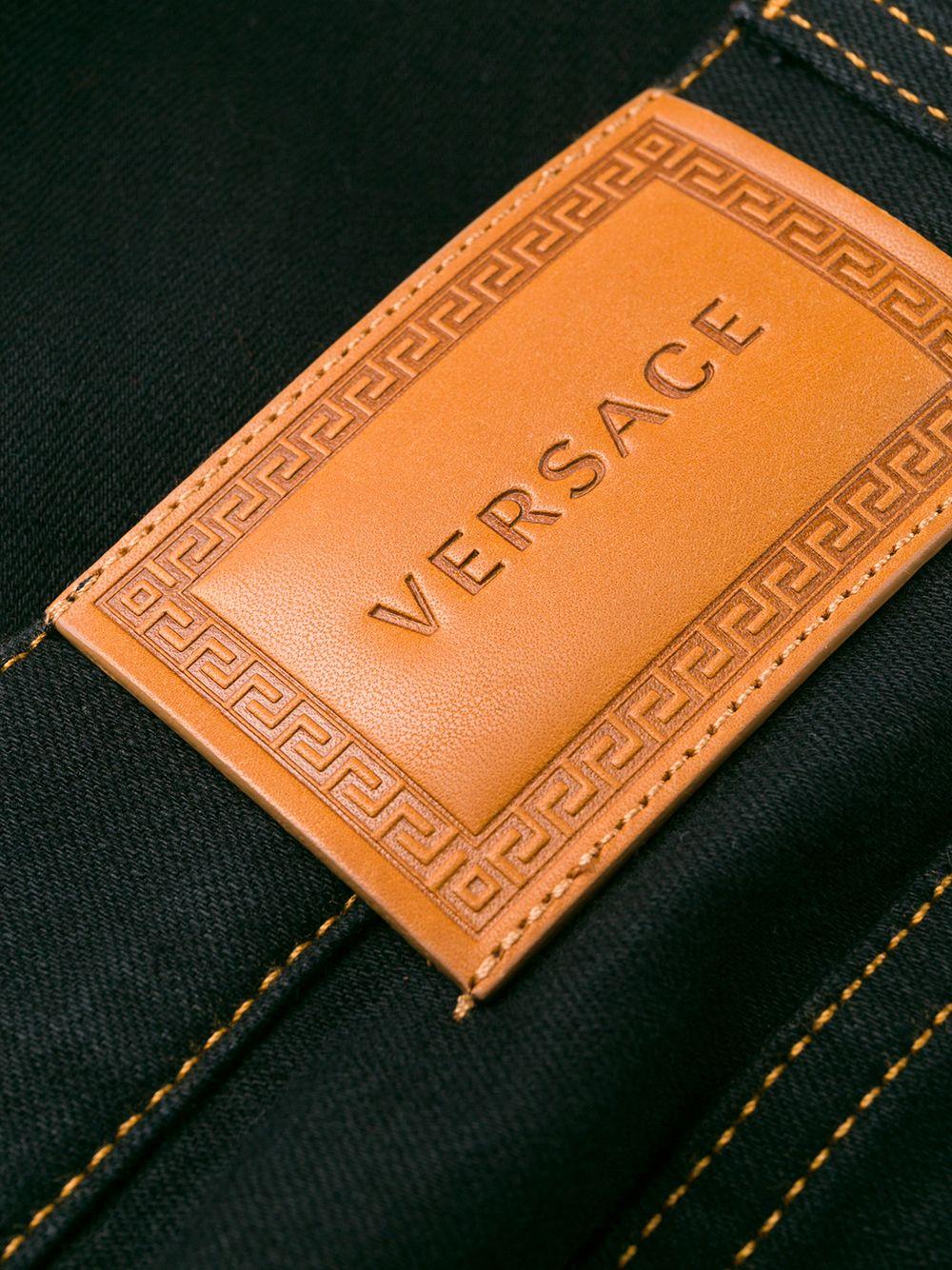 Men's Versace Mens FW19 Black Denim Jeans with Gold-Tone Safety Pin Size 44