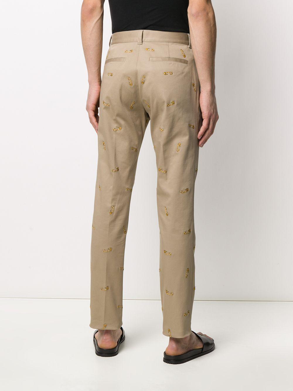 embroidered khaki pants