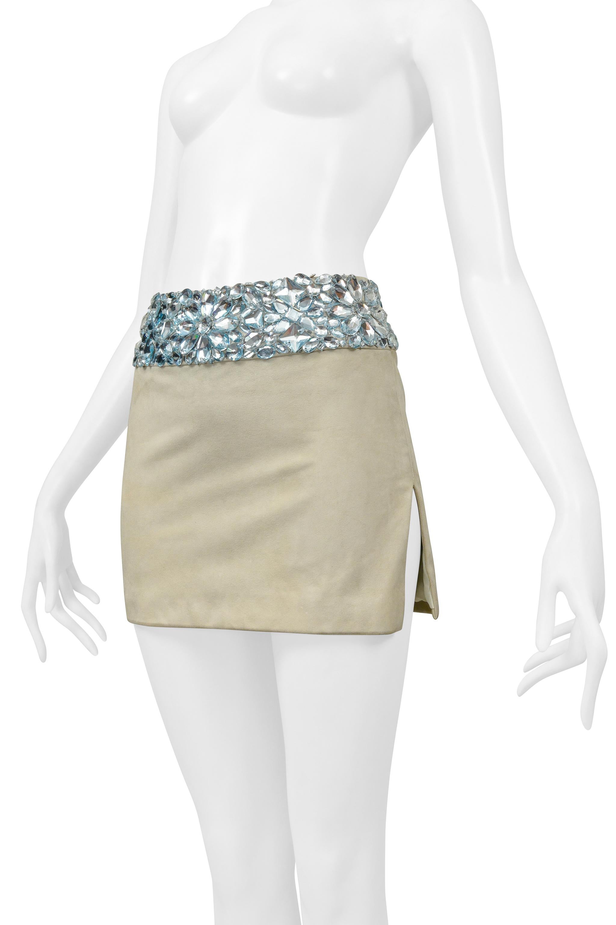 Resurrection Vintage is excited to offer a vintage Versace mint green suede mini skirt featuring giant gem detailing on the waistline, side slit, and a hidden zipper at center back.

Atelier Versace
No size label: Fits like today's size