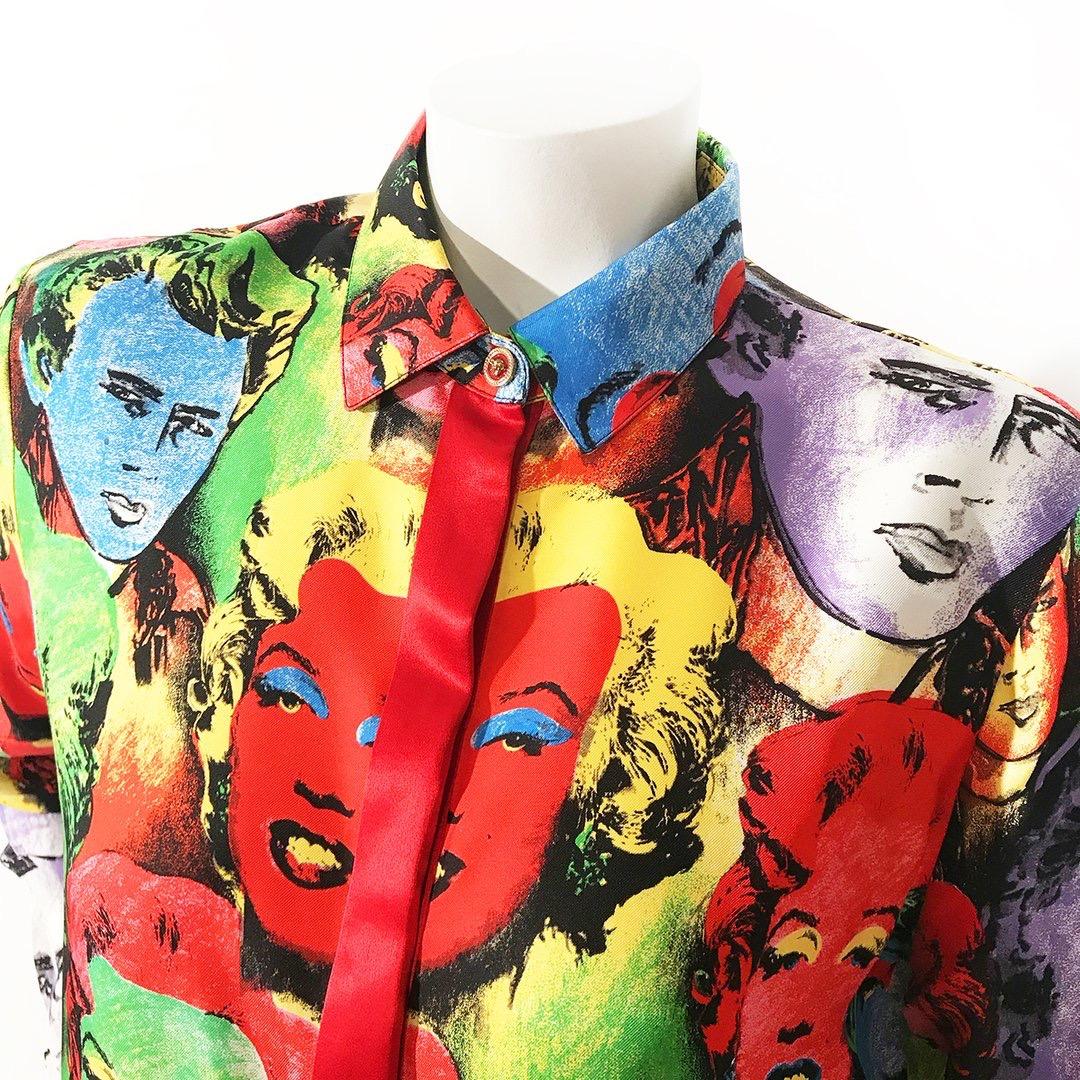 Monroe/Dean Print Tribute Blouse by Versace
Spring 2018 Ready-to-Wear
Iconic Marilyn Monroe/ James Dean Pop Art by Andy Warhol, originally used in Versace's Spring/Summer 1991 collection
Button-down front closure
Medusa top button 
Medusa button on