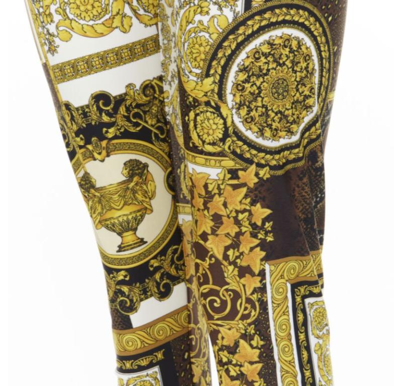 VERSACE Mosaic Barocco black gold brown scaled stretchy leggings IT42 M
Reference: TGAS/C00915
Brand: Versace
Designer: Donatella Versace
Model: A83807 1F00614 5N030
Collection: Mosaic Barocco
Material: Polyamide, Elastane
Color: Gold,
