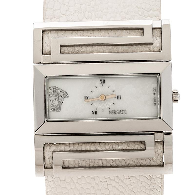 Stand out with this Versace wristwatch. Made from stainless steel, the rectangular case holds a bevelled bezel with the meander pattern on the top and bottom sides. Its mother of pearl dial is contrasted with hour indexes, Roman numerals and hands.