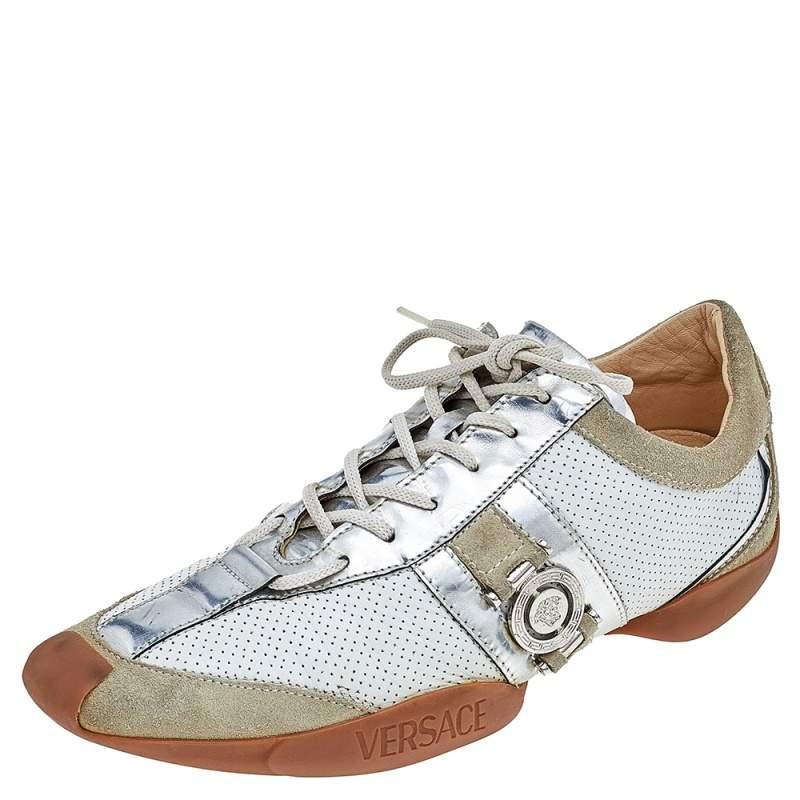 Coming in a classic low-top silhouette, these Versace sneakers are a seamless combination of luxury, comfort, and style. They are made from and suede leather in multiple shades. These sneakers are designed with logo details, laced-up vamps, and