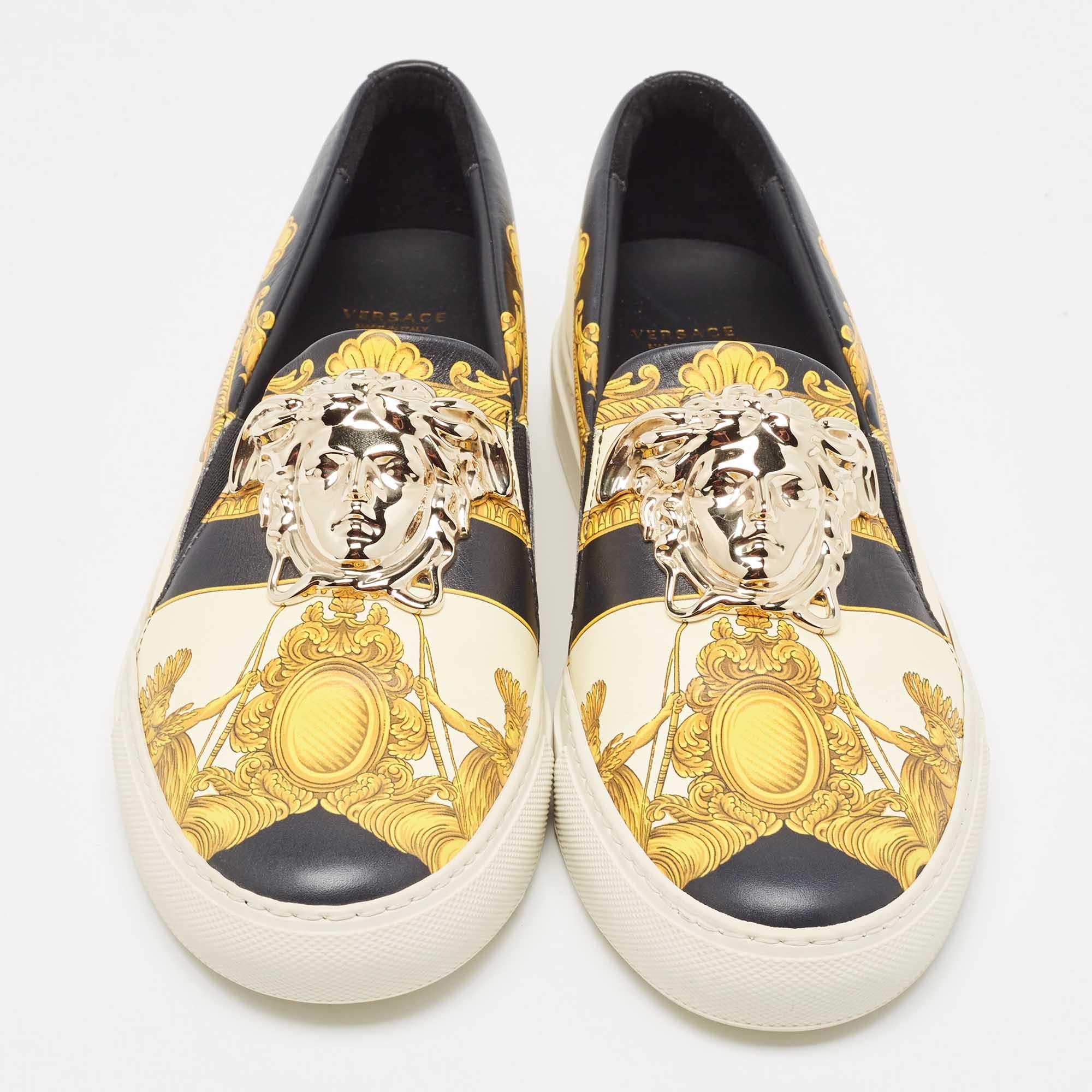 Coming in a classic silhouette, these Versace sneakers are a seamless combination of luxury, comfort, and style. These sneakers are designed with signature details and comfortable insoles.

