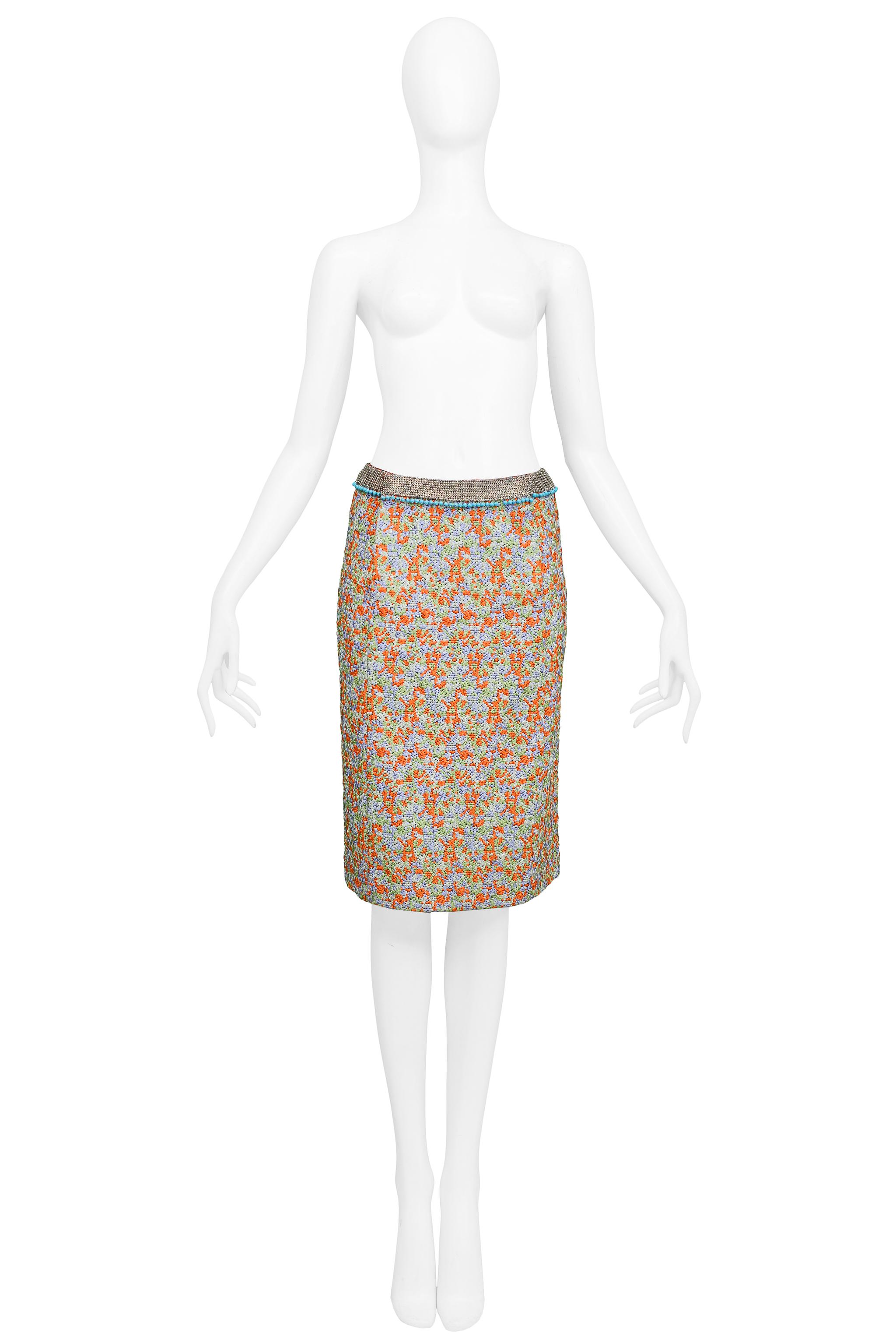 Resurrection Vintage is pleased to offer a rare vintage Gianni Versace multicolor skirt featuring a metal mesh waistband with blue beads. 

Versace 
Size 38
Woven Fabric with Metal Mesh
1999 Collection
Excellent Vintage Condition
Authenticity