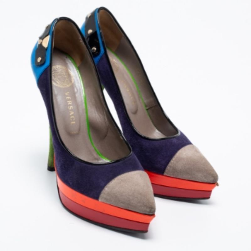 Crafted using multicolor suede and leather, these Versace pumps are meant to add a sophisticated finish to your look of the day. The designer pumps feature pointed toes, low platforms, and 14 cm heels.