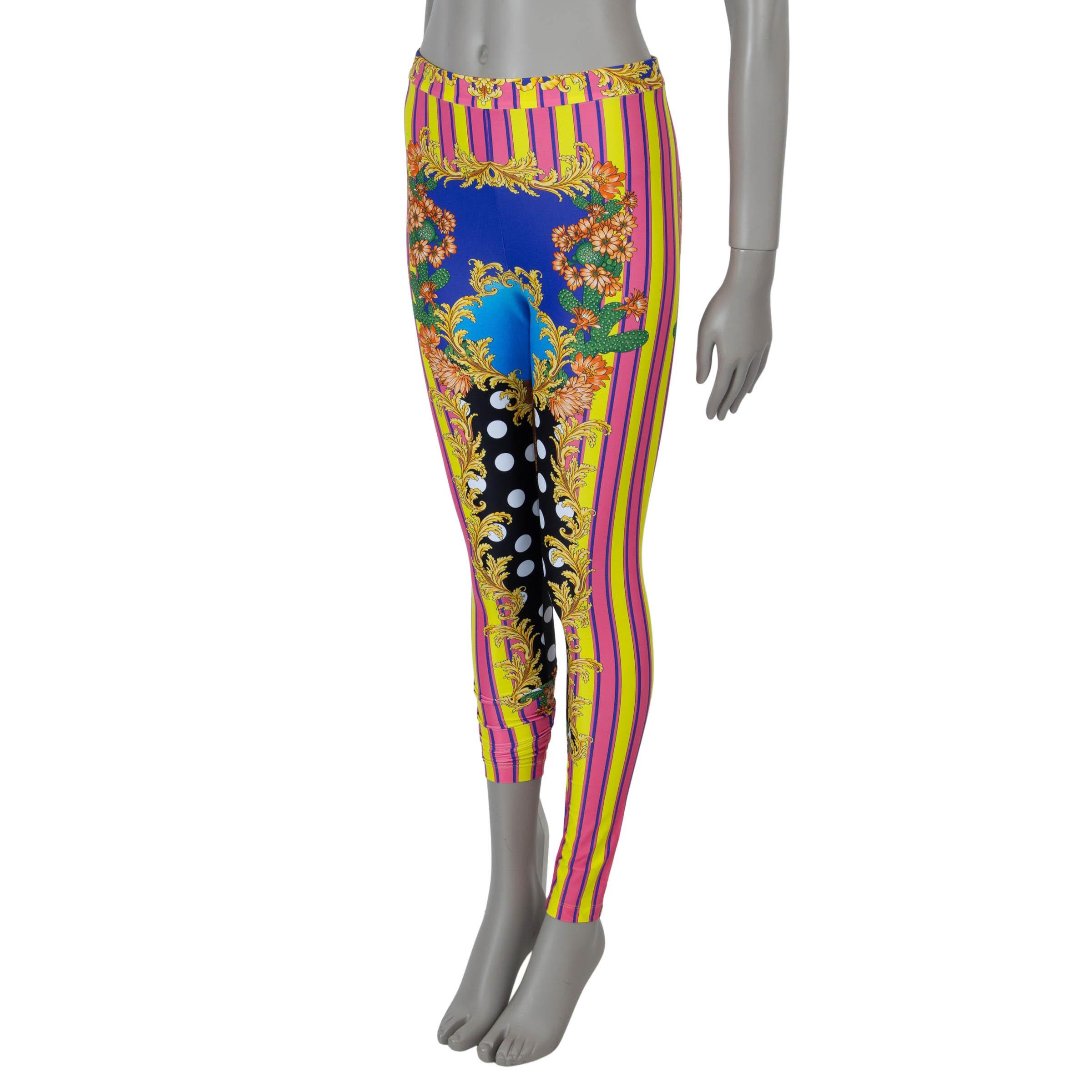 These 100% authentic Versace leggings in multicolor polyamide (78%) and elastane (22%) feature the vibrant Medusa Palm Springs print, embodying the brand's bold aesthetic. Designed with a high waist and a slip-on style, they offer both comfort and