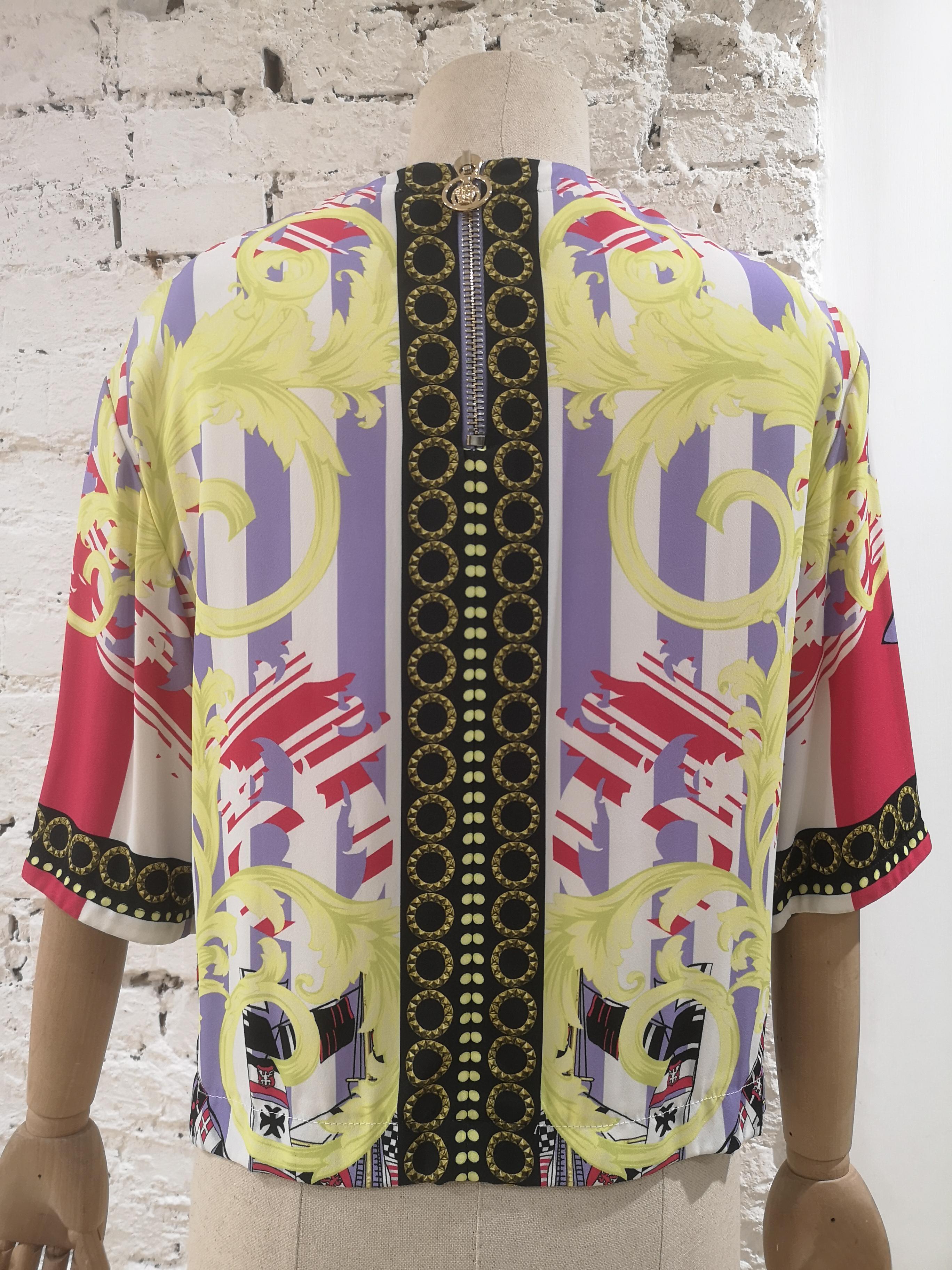 Versace multicoloured blouse NWOT
totally made in italy in size 42