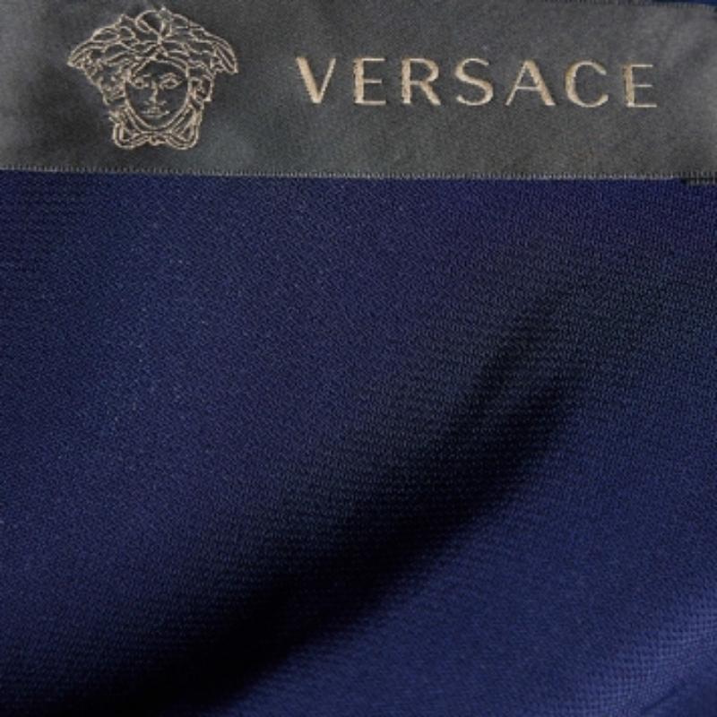 Make a luxe fashion statement by wearing this dress from Versace. It is tailored using fine fabric and showcases a navy blue hue.