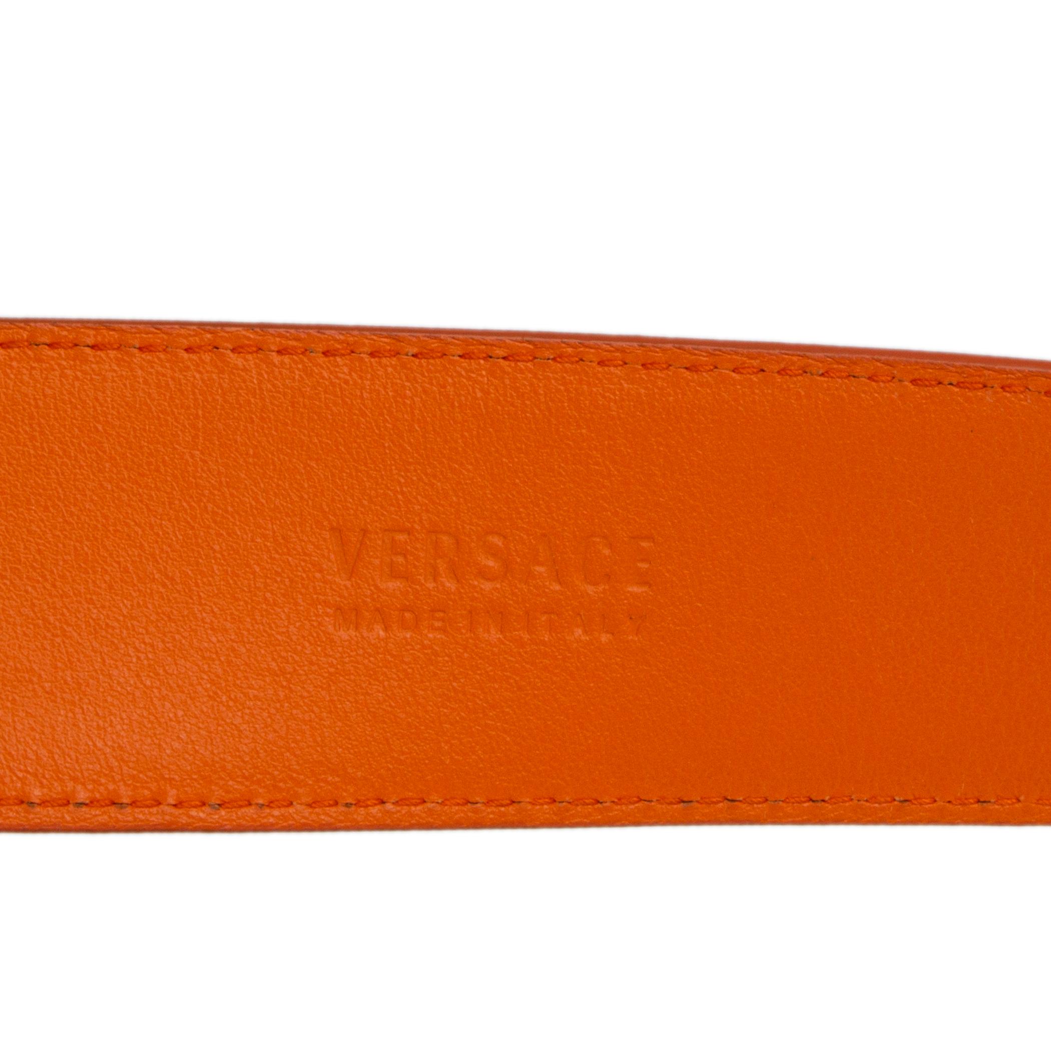 orange leather gold buckle belt
