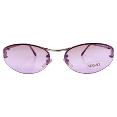 Occhiali da sole Versace ovali senza montatura con lenti viola, circa anni '90