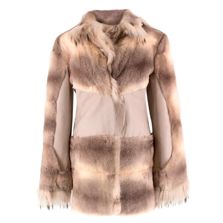 Versace Pahmi Fur Coat

-Fur coat with leather panels
-Lightweight coat
-Hook and eye closure
-Large collar

Please note, these items are pre-owned and may show signs of being stored even when unworn and unused. This is reflected within the