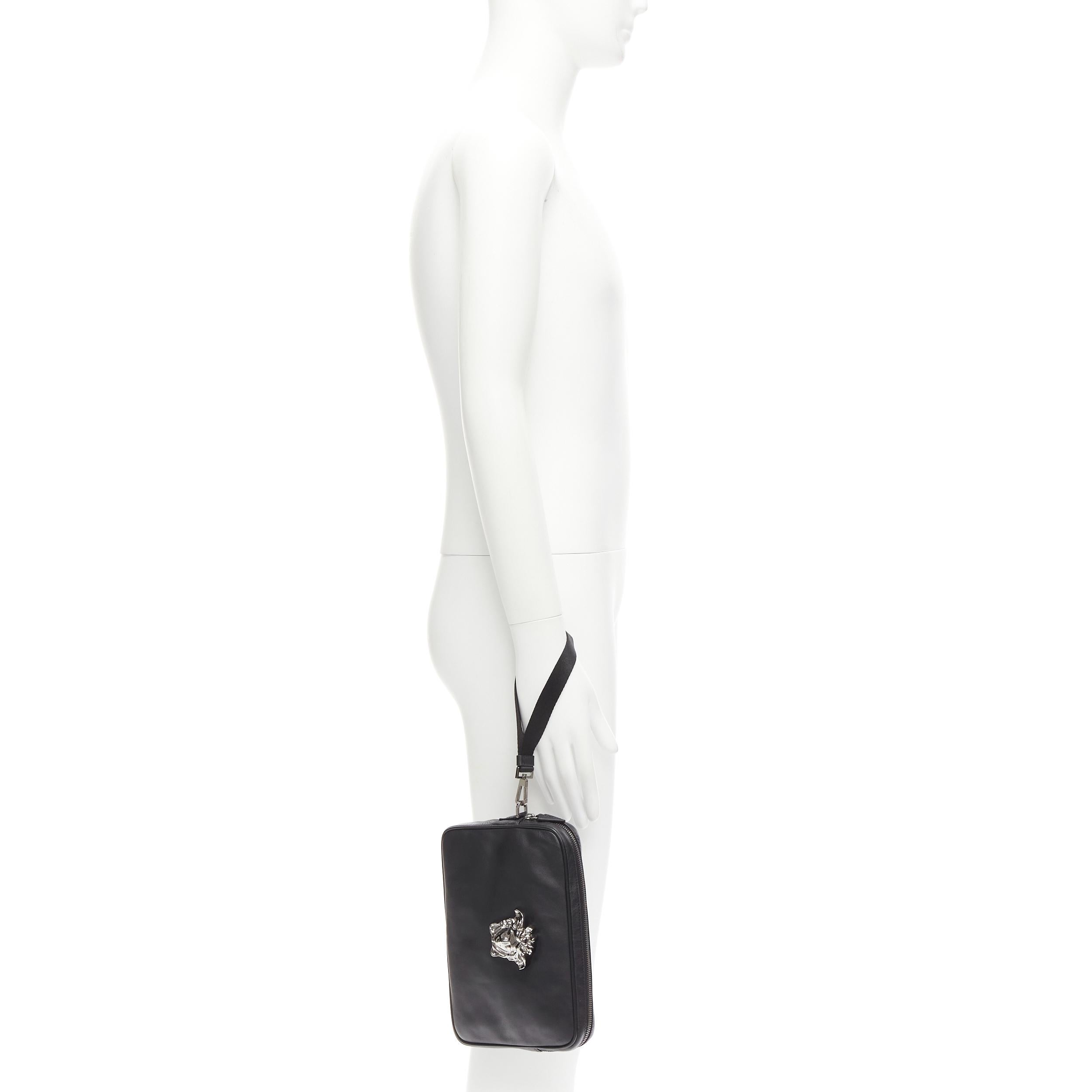 VERSACE Palazzo Medusa black lambskin leather silver zip wristlet clutch bag
Reference: TGAS/E00767
Brand: Versace
Designer: Donatella Versace
Model: DP88507 DVT8ME 1B00E
Collection: Palazzo Medusa
Material: Lambskin Leather, Metal
Color: Black,