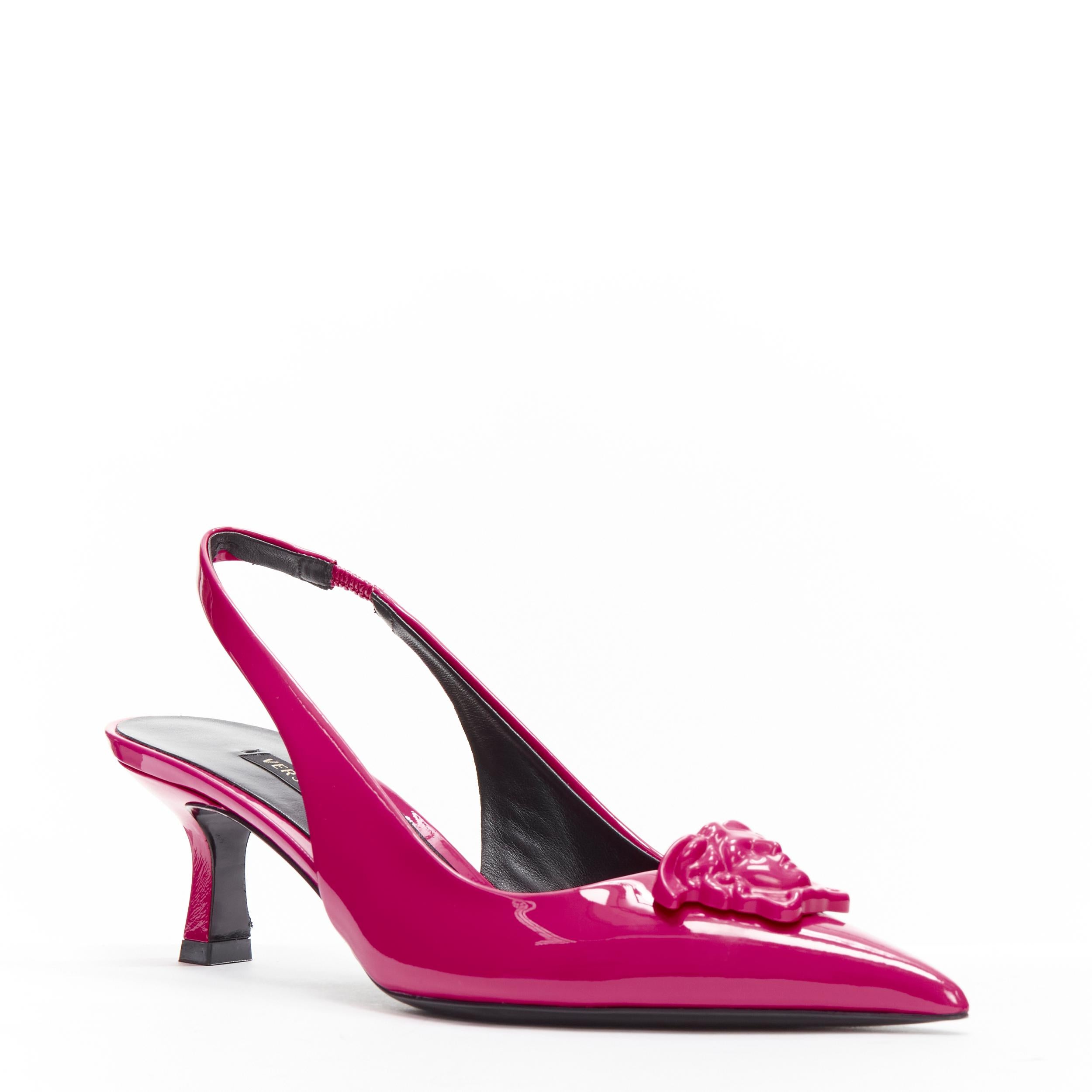 VERSACE Palazzo Medusa fuscia pink sling kitteh heel pointed toe pump EU36
Reference: TGAS/C01776
Brand: Versace
Designer: Donatella Versace
Model: DST638H D2VE 1P660
Material: Leather
Color: Black
Pattern: Solid
Estimated Retail Price: USD 890
Made