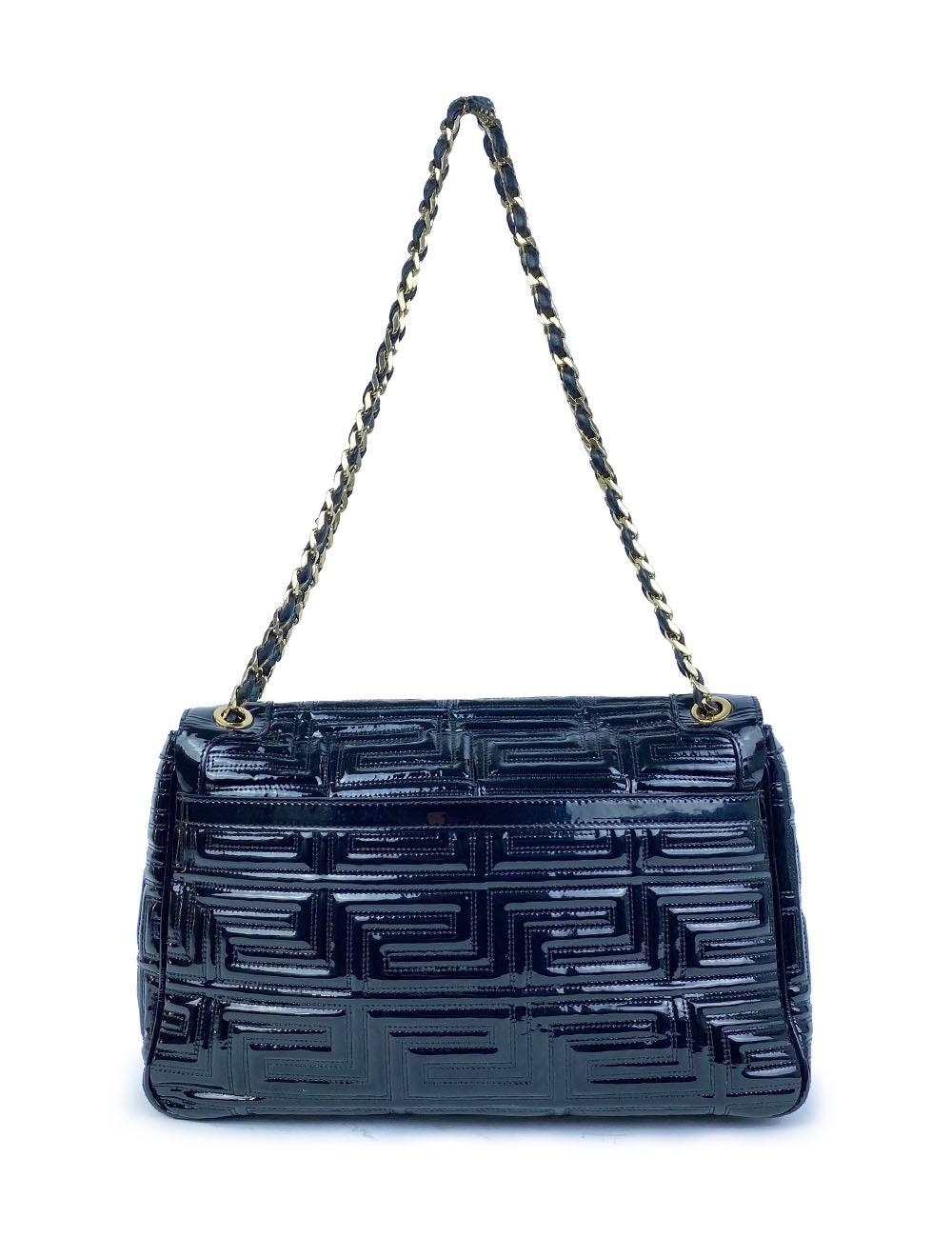 Versace Patent Leather Shoulder Handbag

Additional information:
Material: Patent Leather
Hardware: Gold Tone
Measurements: 32 W x 6 D x 21 H cm
Handle Drop: 31 cm
Overall condition: Very Good
Interior condition: Signs of use.
External condition: