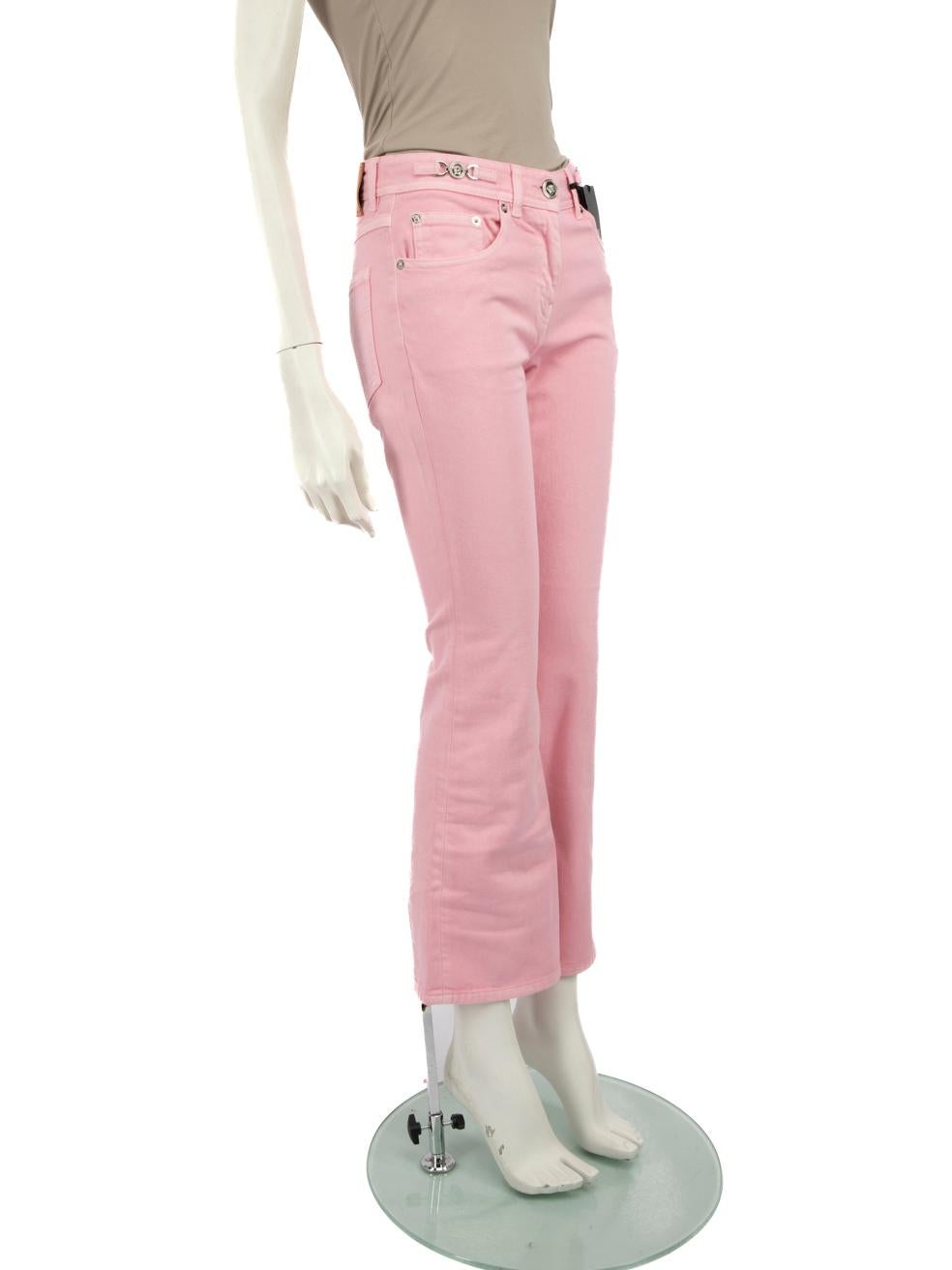 CONDITION is New with tags on this brand new Versace designer item.
  
  Details
  
  
  Pink 
  
  Denim
  
  Jeans
  
  Flared
  
  High rise
  
  Silver medusa logo detail
  
  Medusa embossed button
  
  3x Front pockets
  
  2x Back pockets
  
