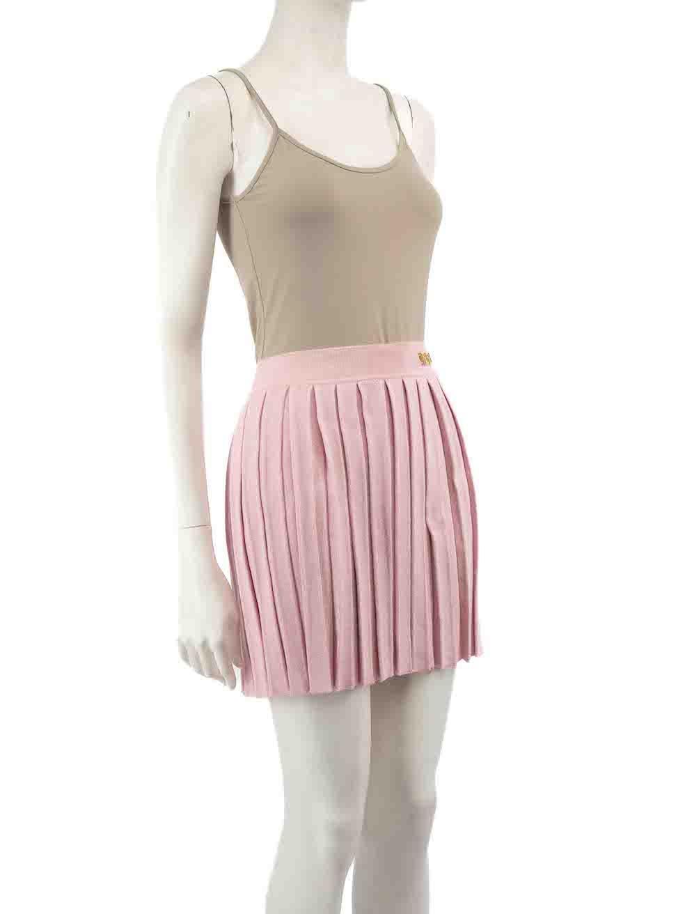 CONDITION is Very good. Hardly any visible wear to skirt is evident on this used Versace designer resale item.
 
 
 
 Details
 
 
 Pink
 
 Silk
 
 Skirt
 
 Pleated
 
 Mini
 
 Gold logo detail
 
 Elasticated waistband
 
 
 
 
 
 Made in Italy
 
 
 
