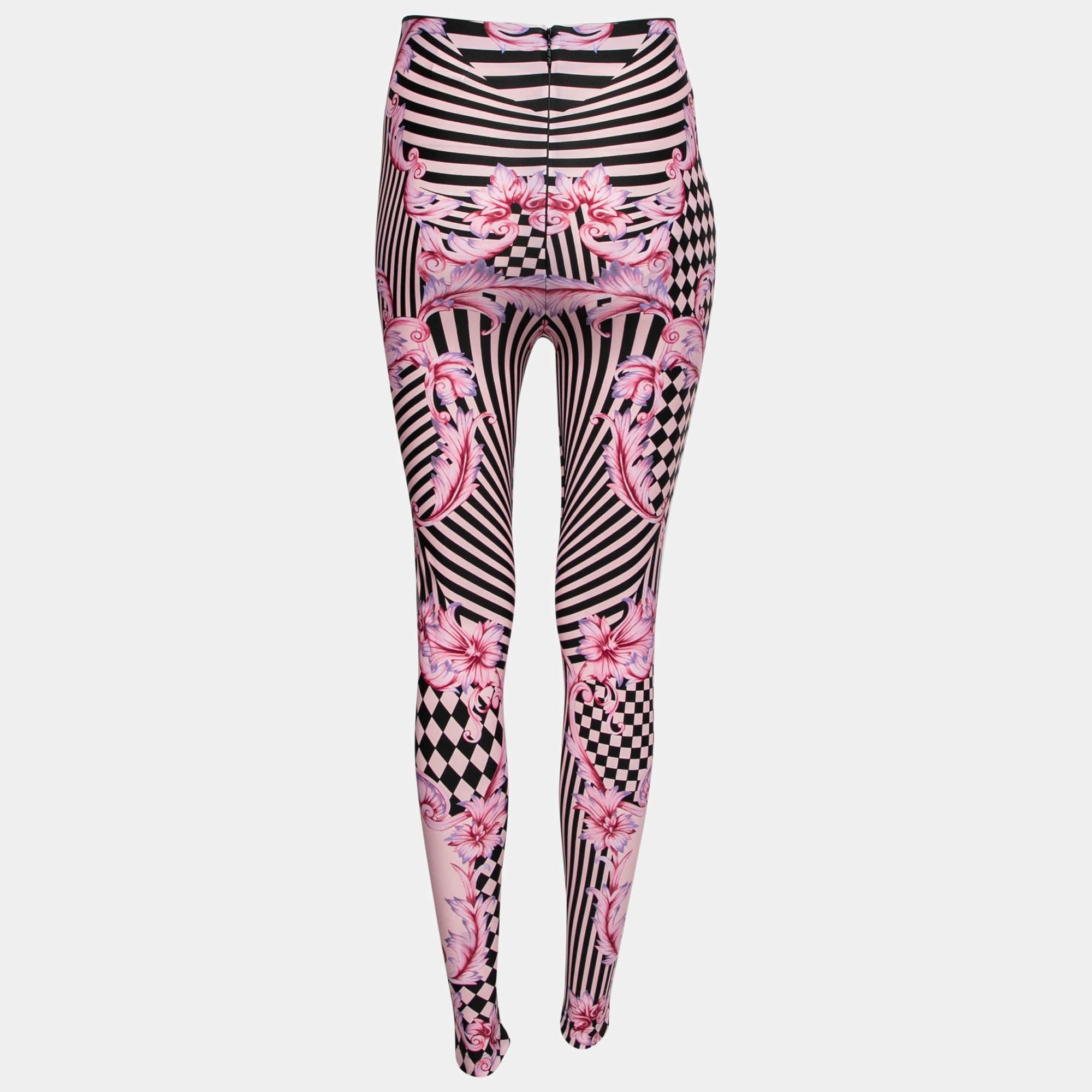 Create a chic look with these striped and Baroque print leggings from Versace. They've been made from fine materials and have a slim fit. Team them with a simple black tank top to balance the ensemble.

