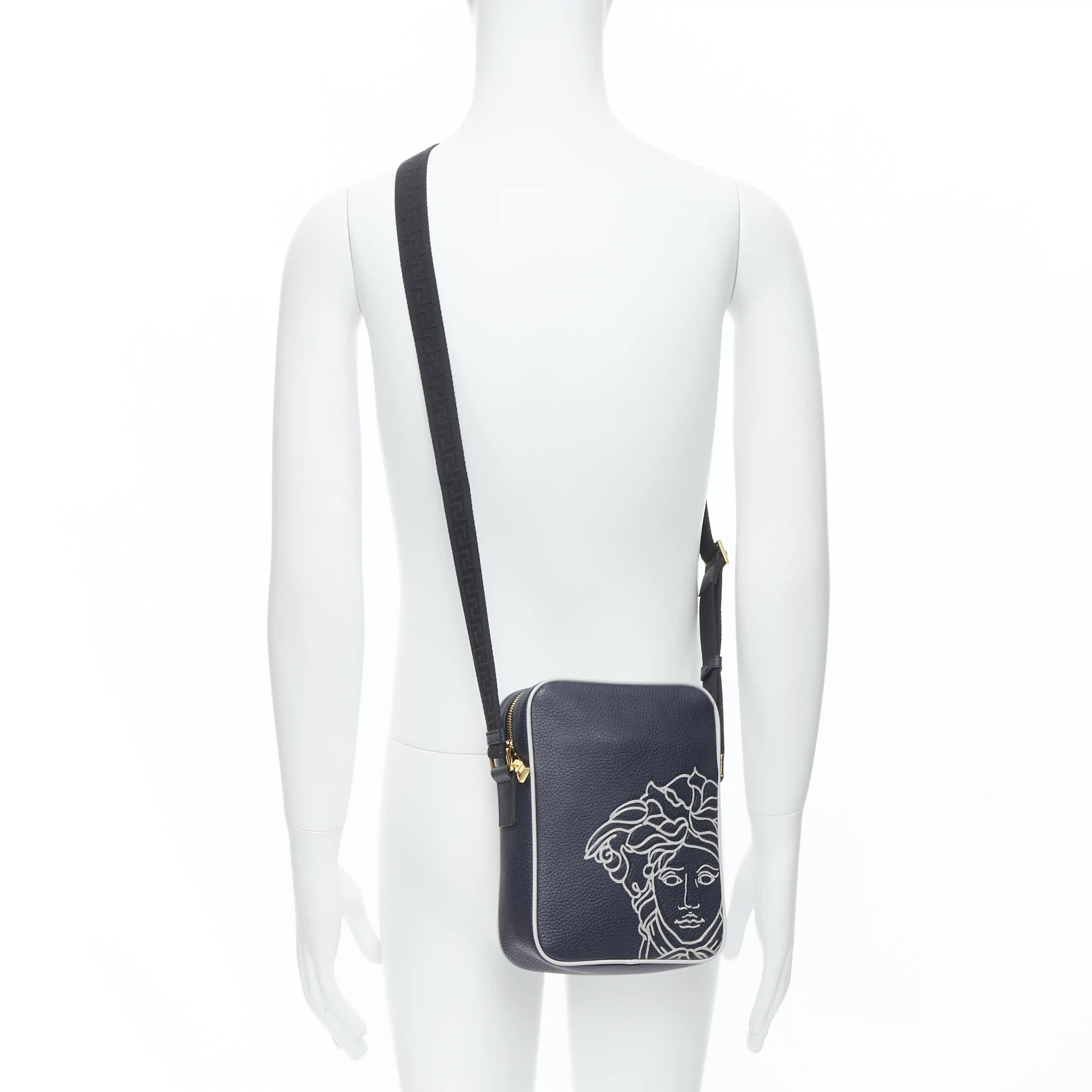 VERSACE Pop Medusa navy grey calf leather Greca crossbody messenger bag
Reference: TGAS/C00129
Brand: Versace
Designer: Donatella Versace
Model: DL28085 DVTG4M K044H
Collection: Pop Medusa
Material: Leather
Color: Navy, Grey
Pattern: Solid
Closure: