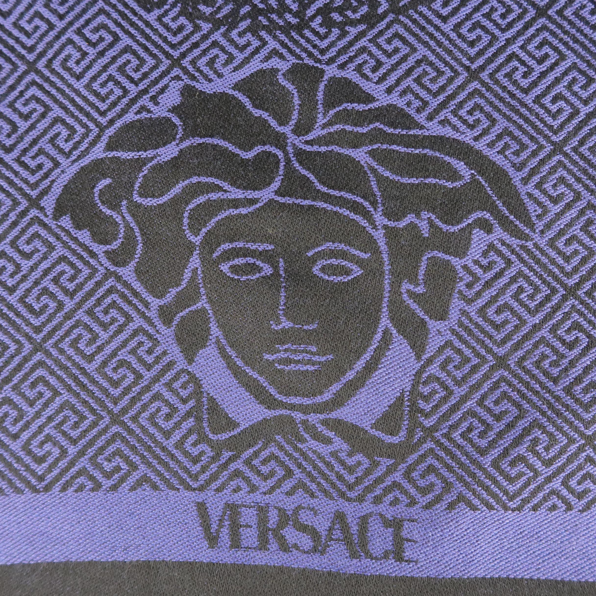 GIANNI VERSACE winter scarf comes in black and purple wool knit with all over pattern, fringed edge, and double Medusa logo print. Wear around label. As-is. Made in Italy.
 
Very Good Pre-Owned Condition.
 
72 x 16.5 in.