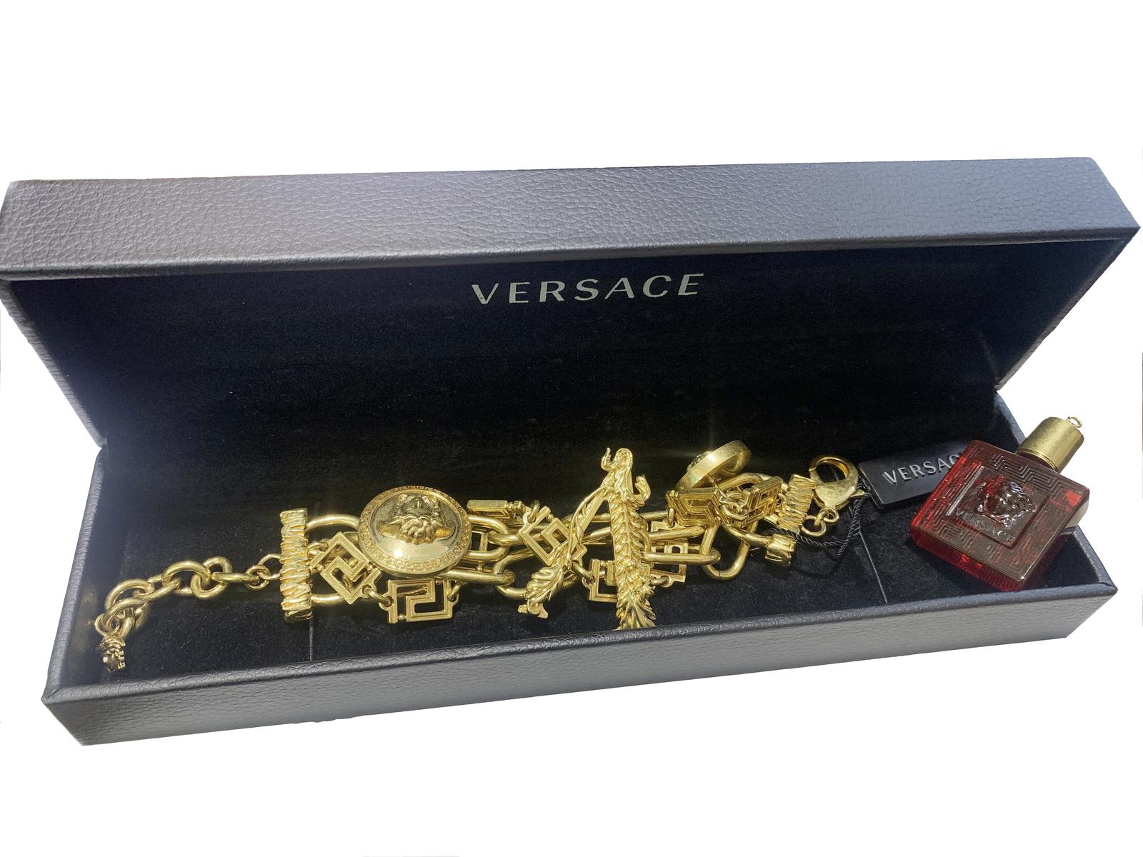 Versace Rare Gold Tone Charm Bracelet In Excellent Condition For Sale In New York, NY